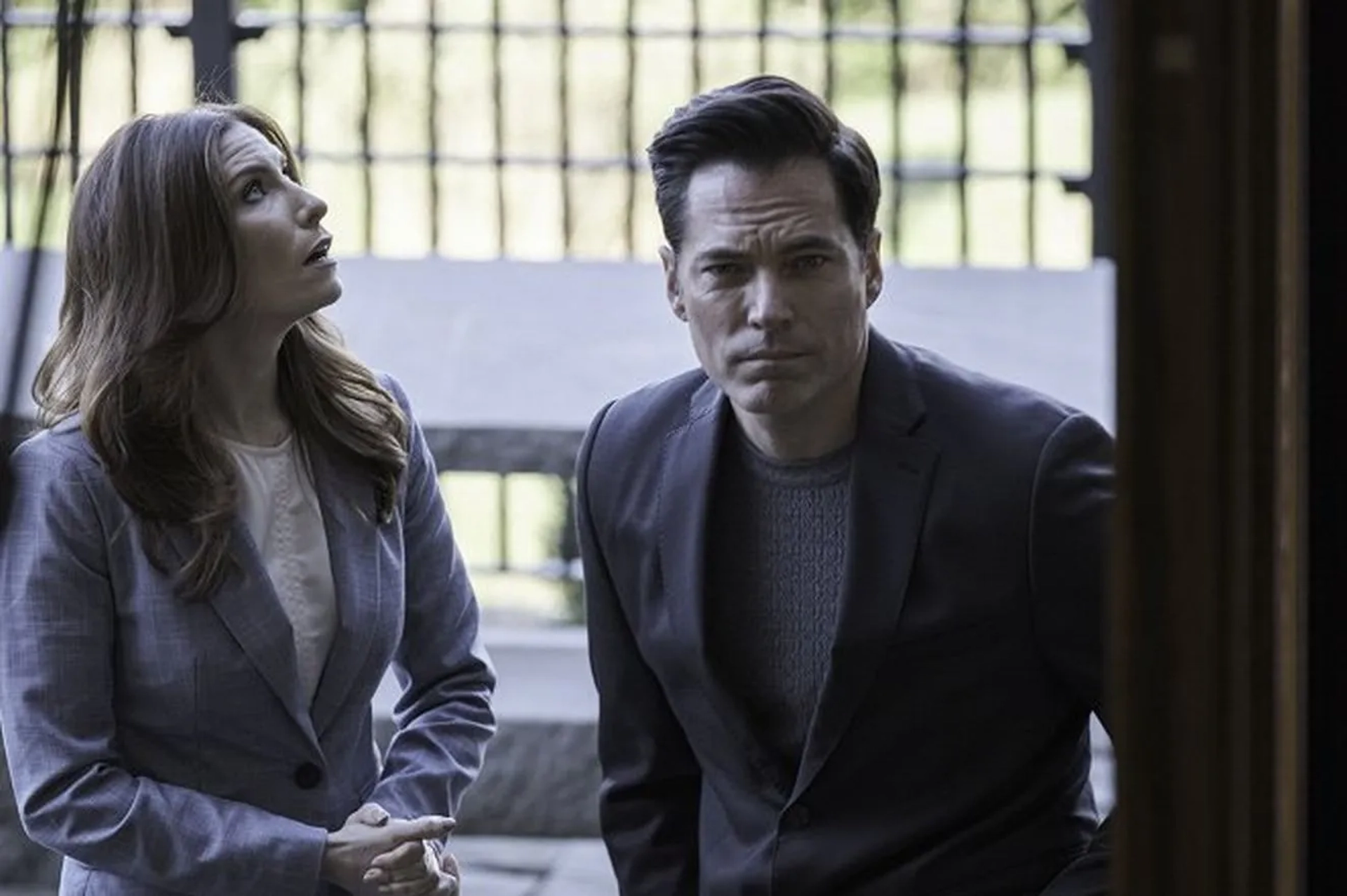 Tim Rozon and Sarah Levy in SurrealEstate (2021)