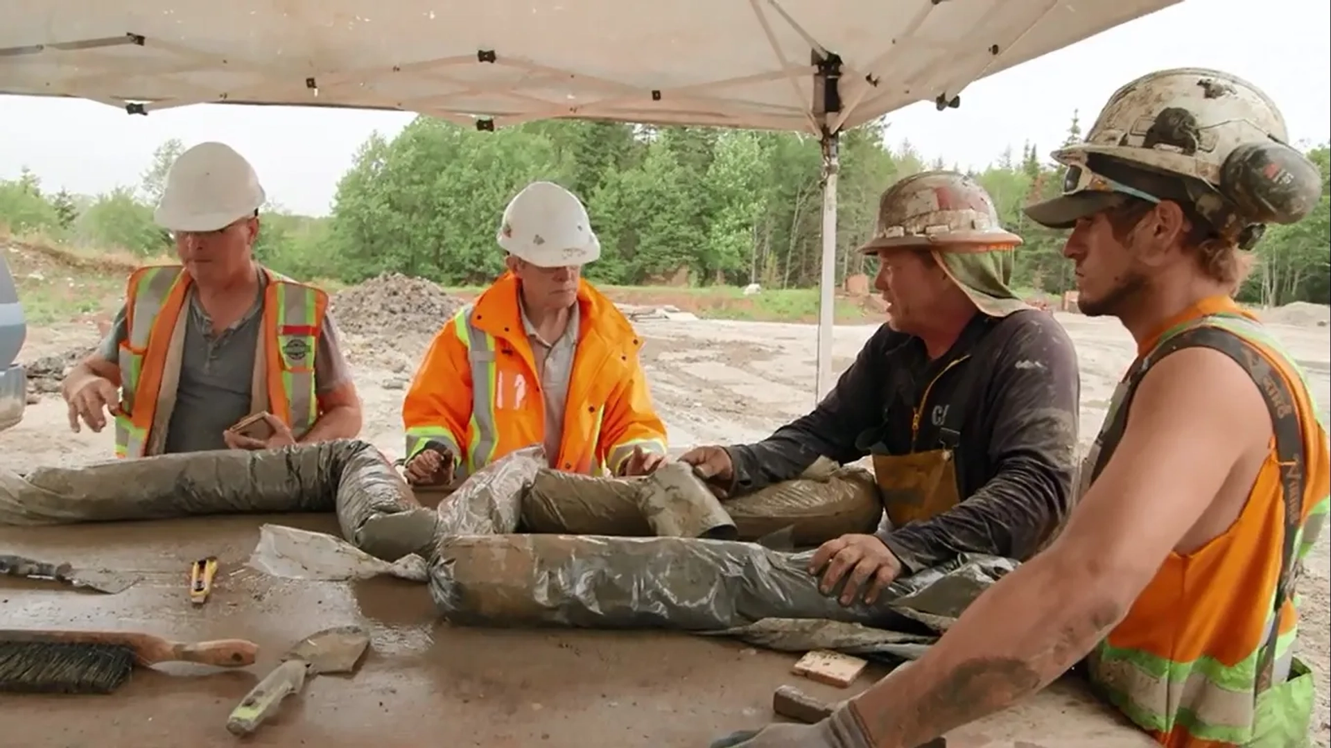 Colten Robinson, Mike Tedford, Craig Tester, and Terry Matheson in The Curse of Oak Island: Bromancing the Stones (2020)