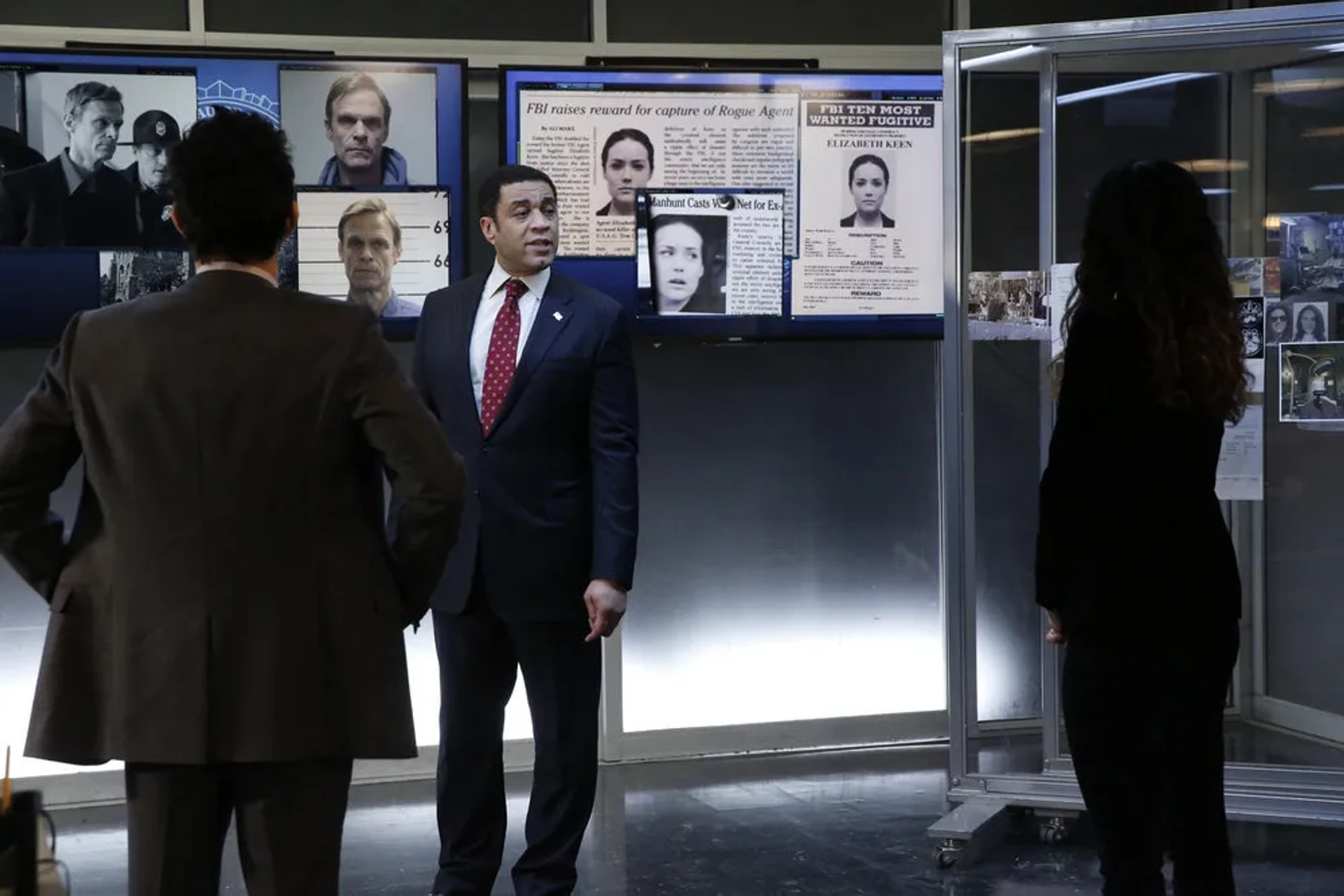 Harry Lennix, Amir Arison, and Mozhan Marnò in The Blacklist (2013)