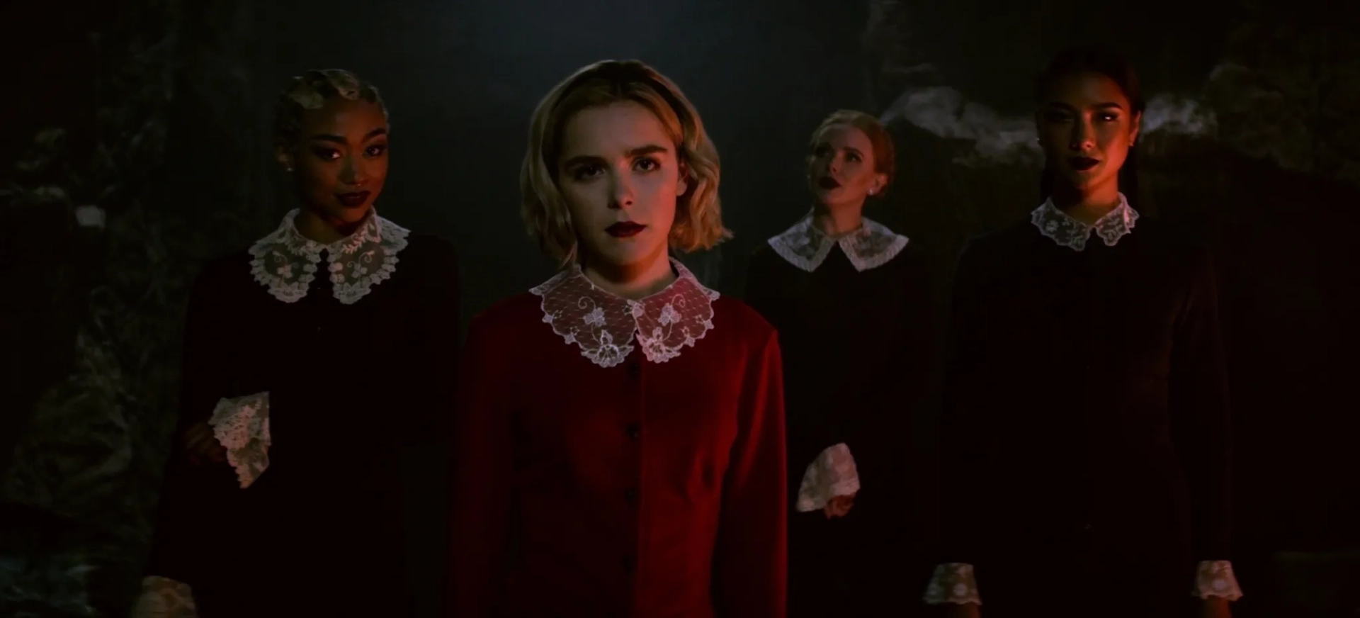 Kiernan Shipka, Tati Gabrielle, Abigail Cowen, and Adeline Rudolph in Chilling Adventures of Sabrina (2018)