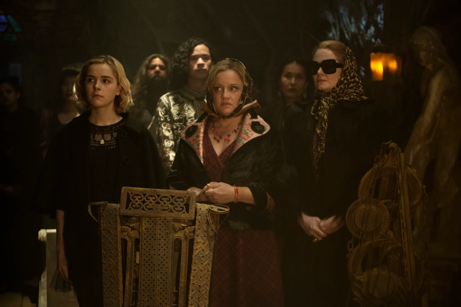 Miranda Otto, Lucy Davis, and Kiernan Shipka in Chilling Adventures of Sabrina (2018)