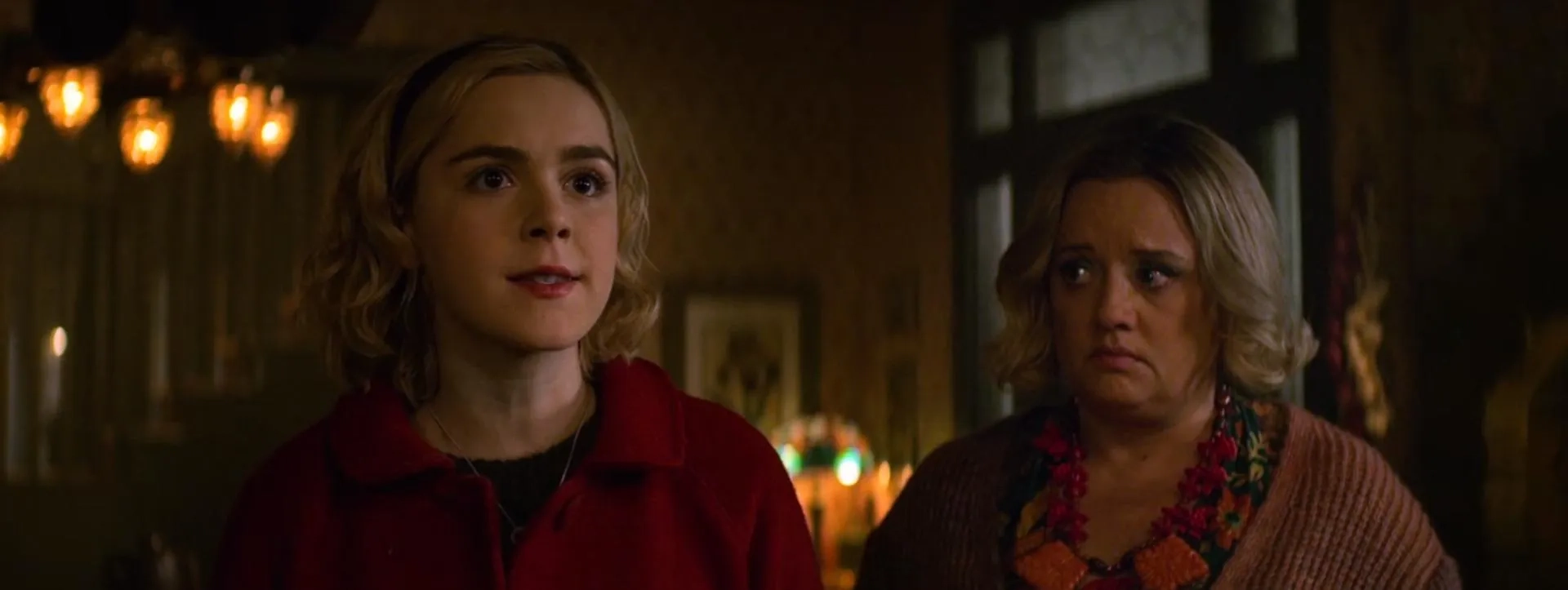 Lucy Davis and Kiernan Shipka in Chilling Adventures of Sabrina (2018)