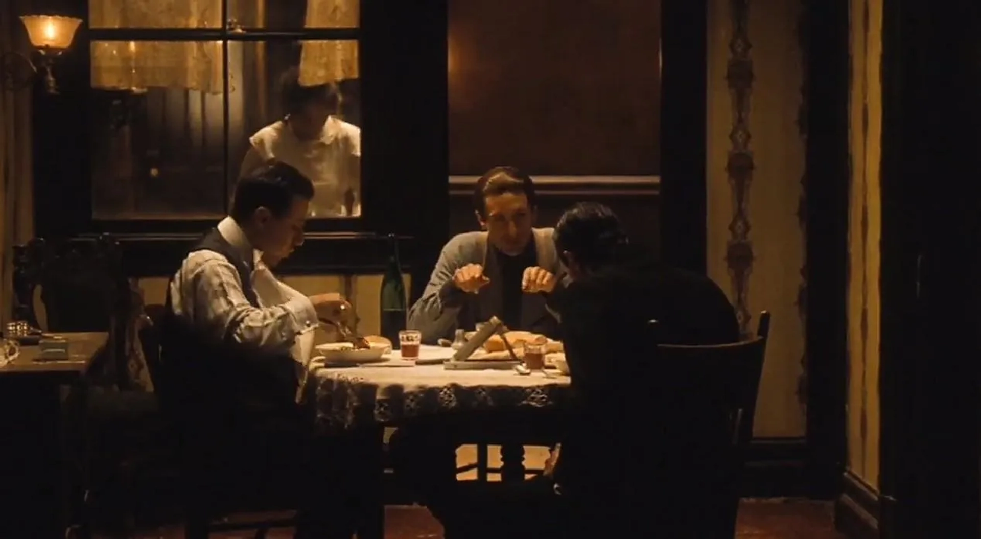 Robert De Niro, Francesca De Sapio, and Bruno Kirby in The Godfather Part II (1974)