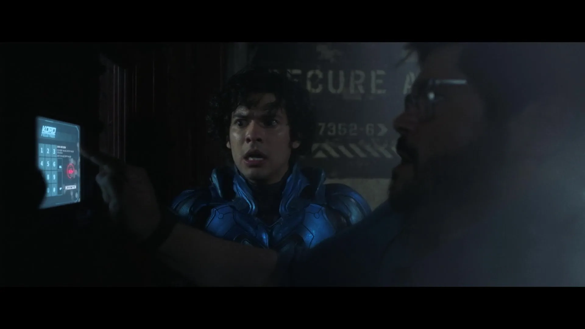 Harvey Guillén and Xolo Maridueña in Blue Beetle (2023)