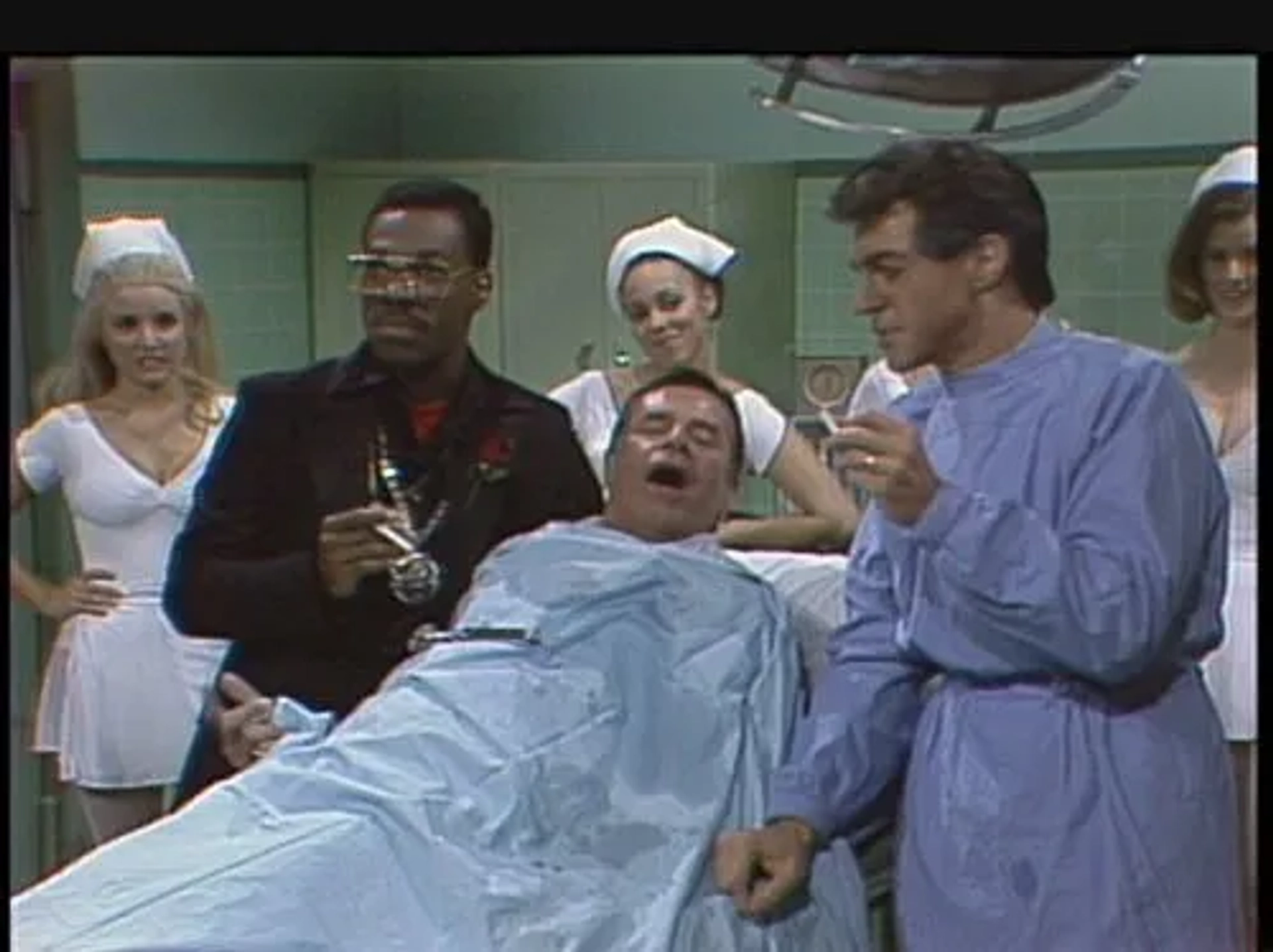 Julia Louis-Dreyfus, Eddie Murphy, Jerry Lewis, and Joe Piscopo in Saturday Night Live (1975)