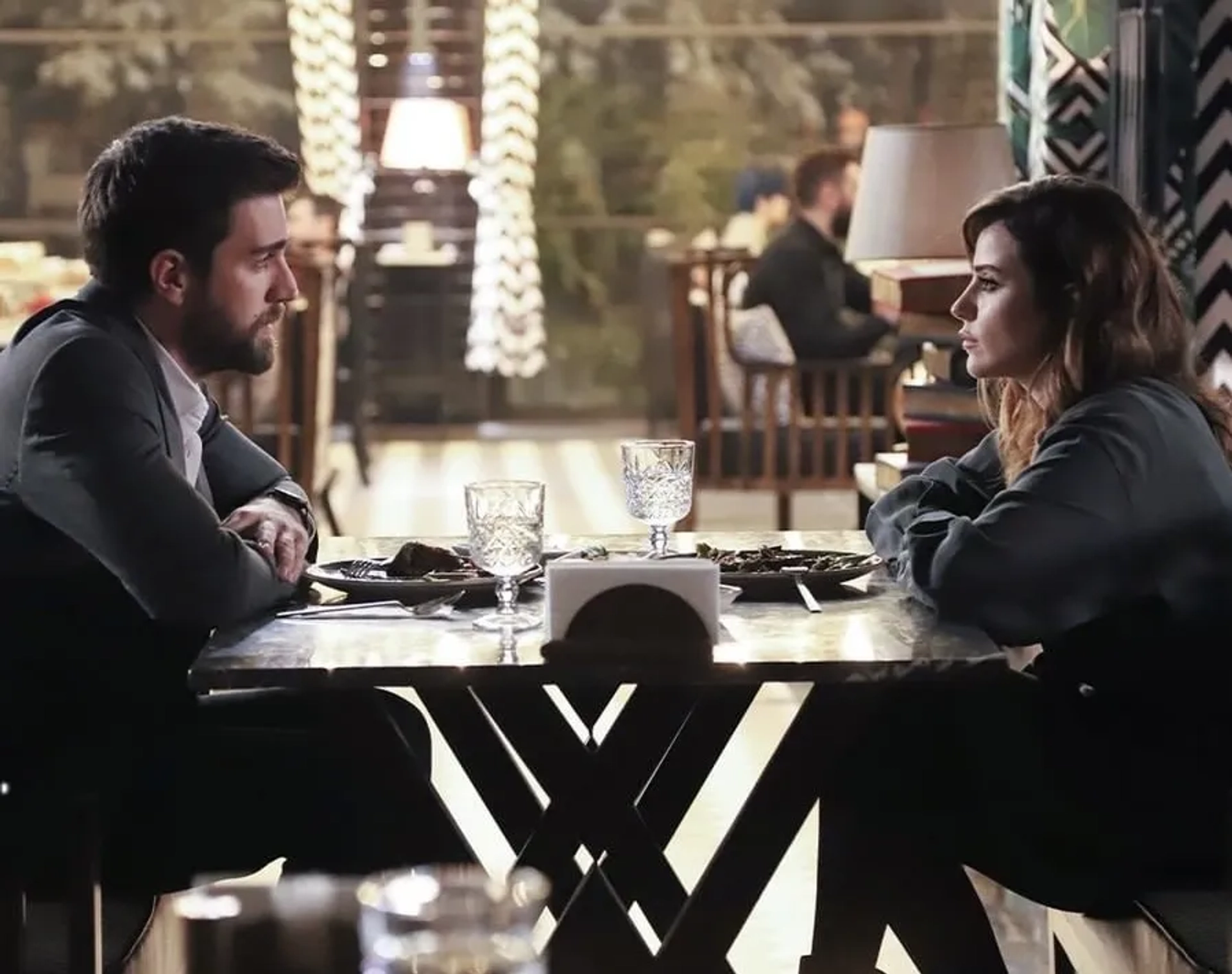 Ezgi Eyüboglu and Caglar Ertugrul in The Shadow Team (2021)