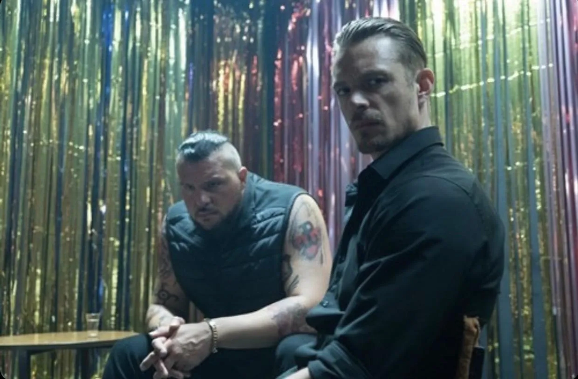 Joel Kinnaman and Srbo Markovic in The Informer (2019)