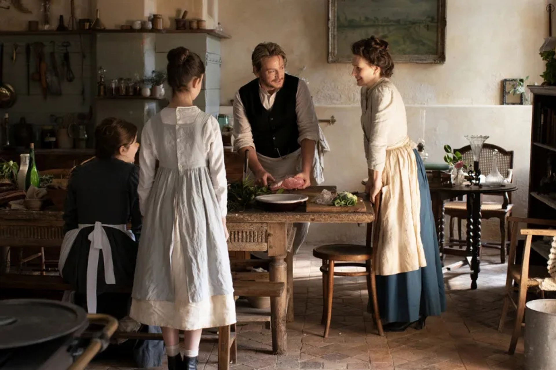 Juliette Binoche and Benoît Magimel in The Taste of Things (2023)