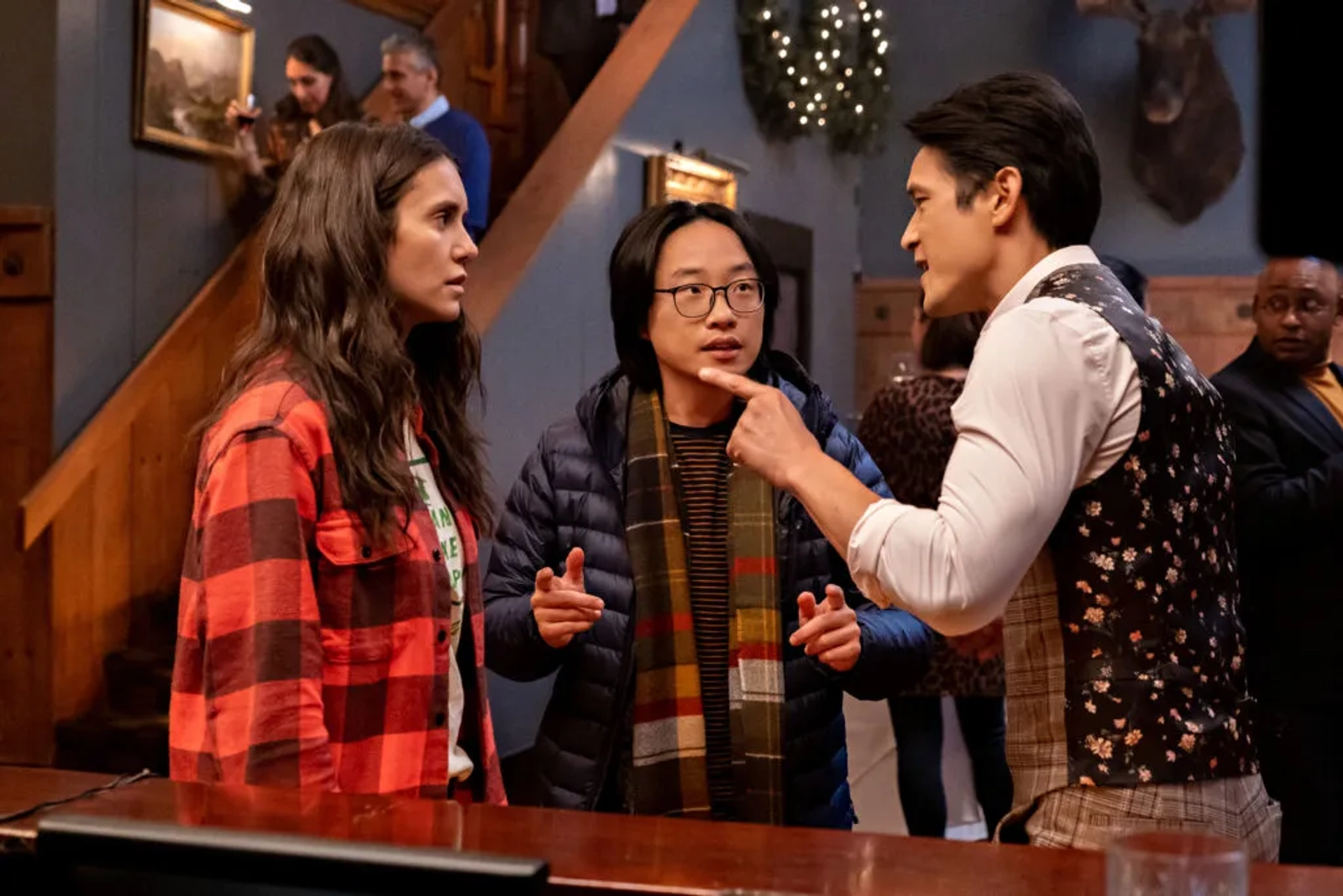 Harry Shum Jr., Nina Dobrev, and Jimmy O. Yang in Love Hard (2021)