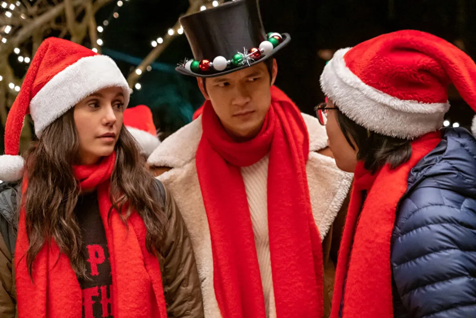 Harry Shum Jr., Nina Dobrev, and Jimmy O. Yang in Love Hard (2021)