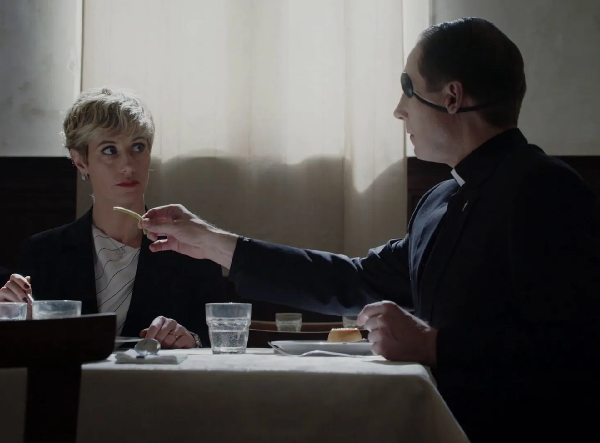 Cécile de France and J. David Hinze in The New Pope (2020)