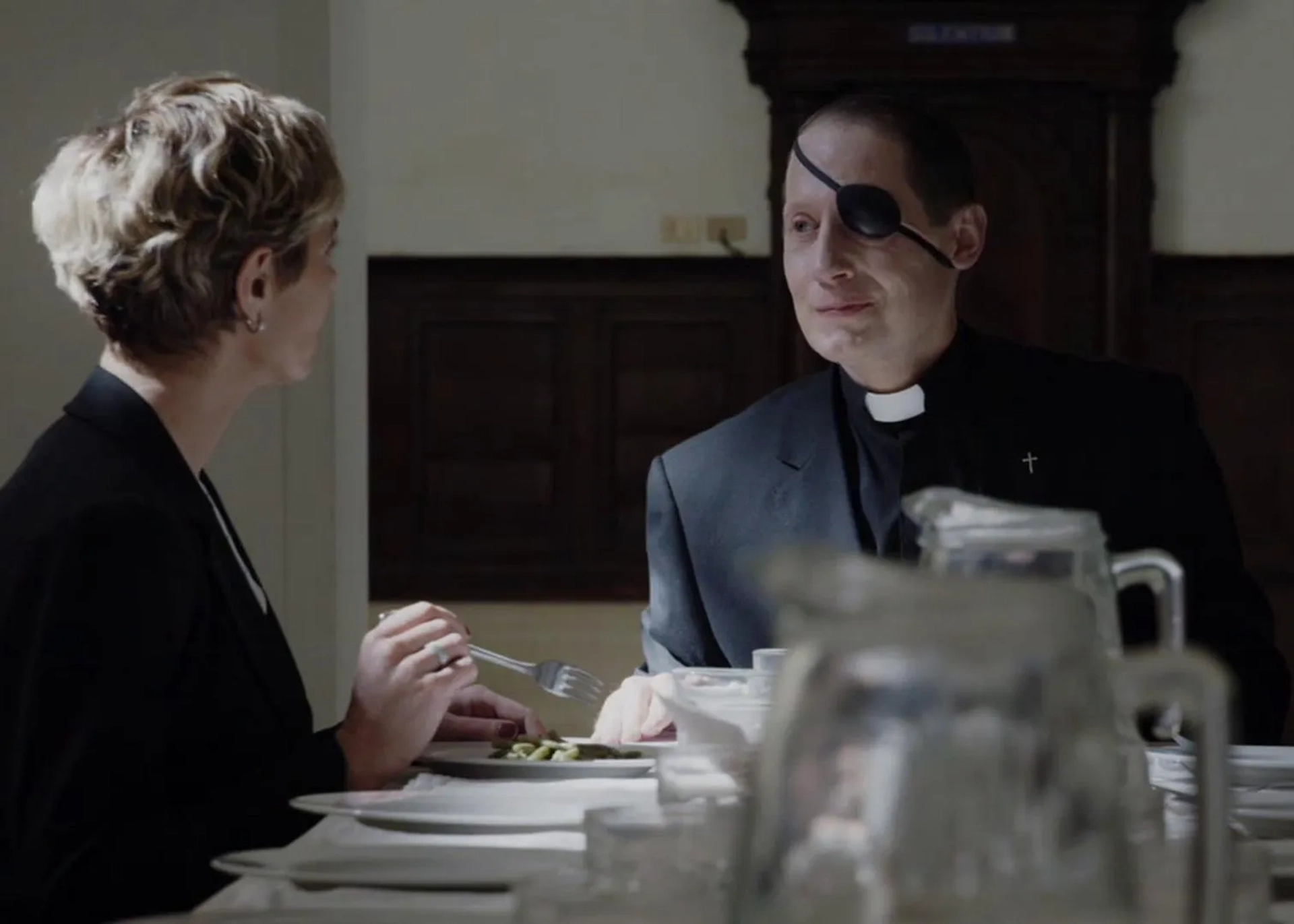 Cécile de France and J. David Hinze in The New Pope (2020)