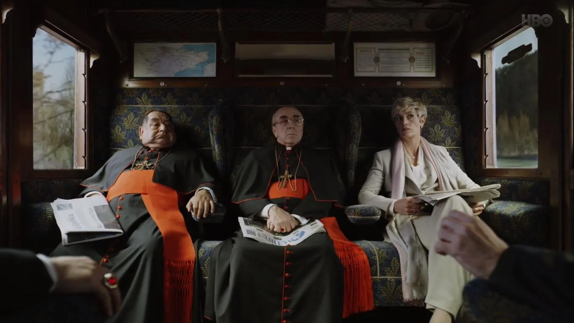 Cécile de France, Ramón García, and Silvio Orlando in The New Pope (2020)