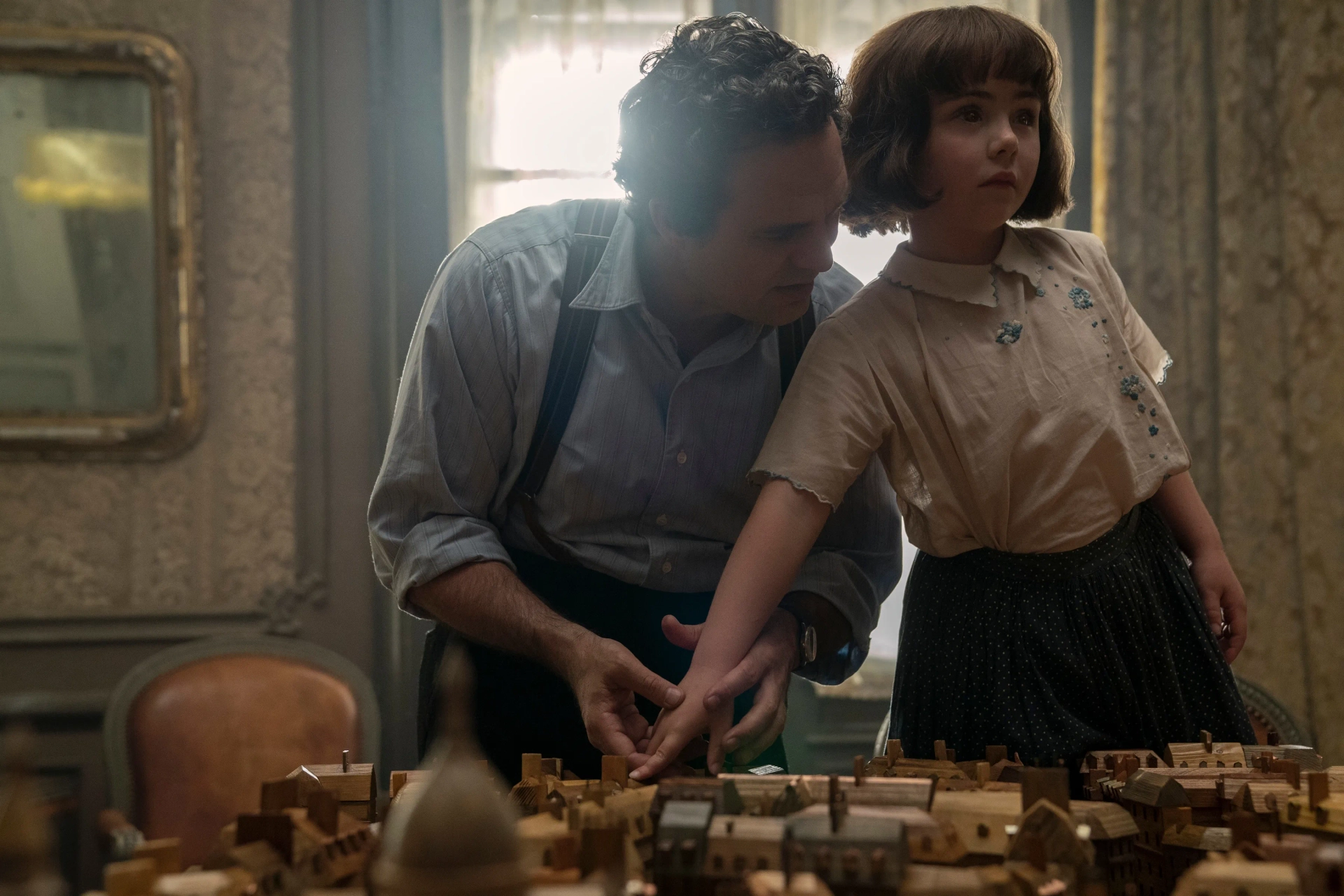 Mark Ruffalo and Nell Sutton in All the Light We Cannot See (2023)