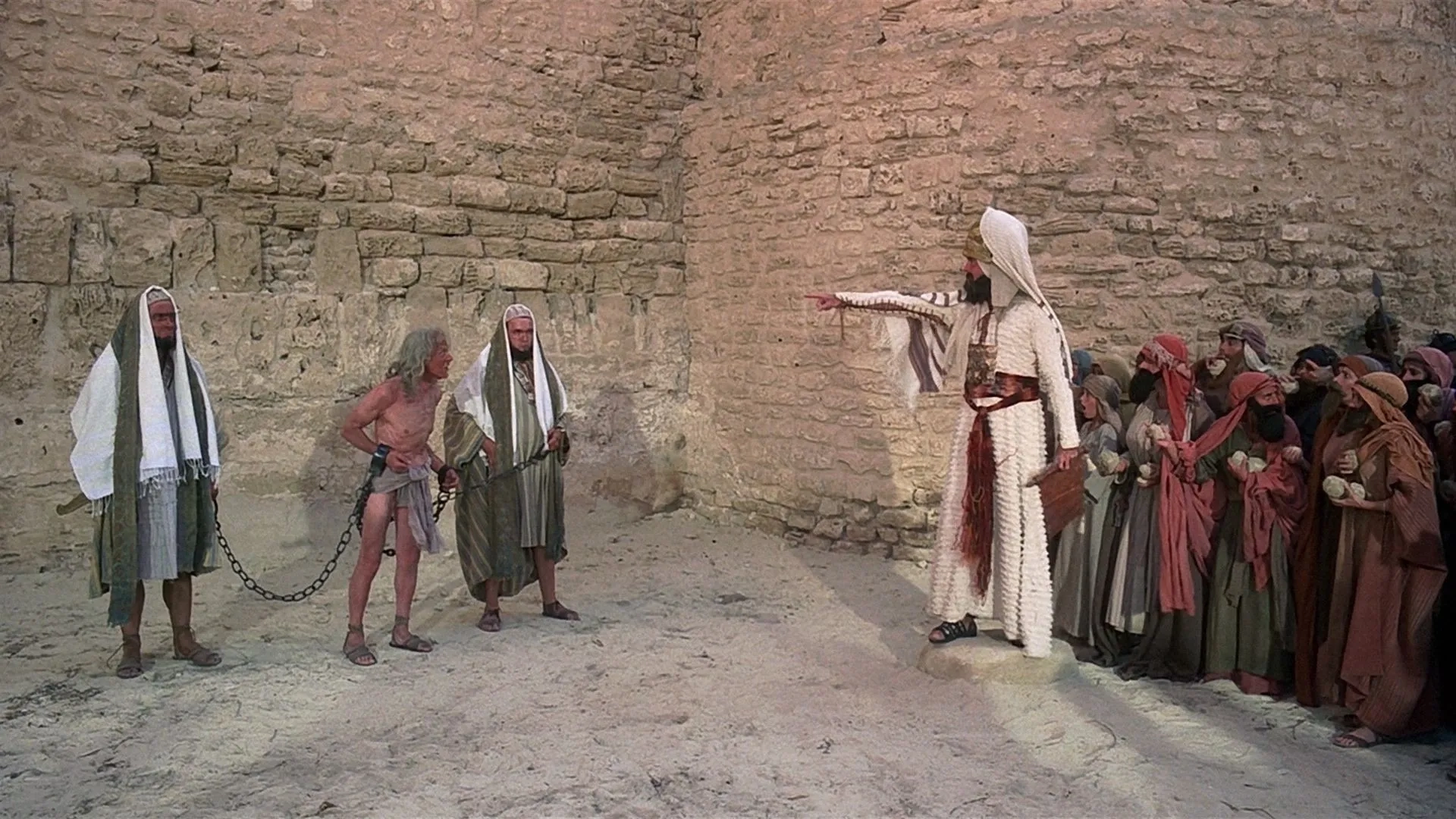 John Cleese, John Young, and Monty Python in Life of Brian (1979)