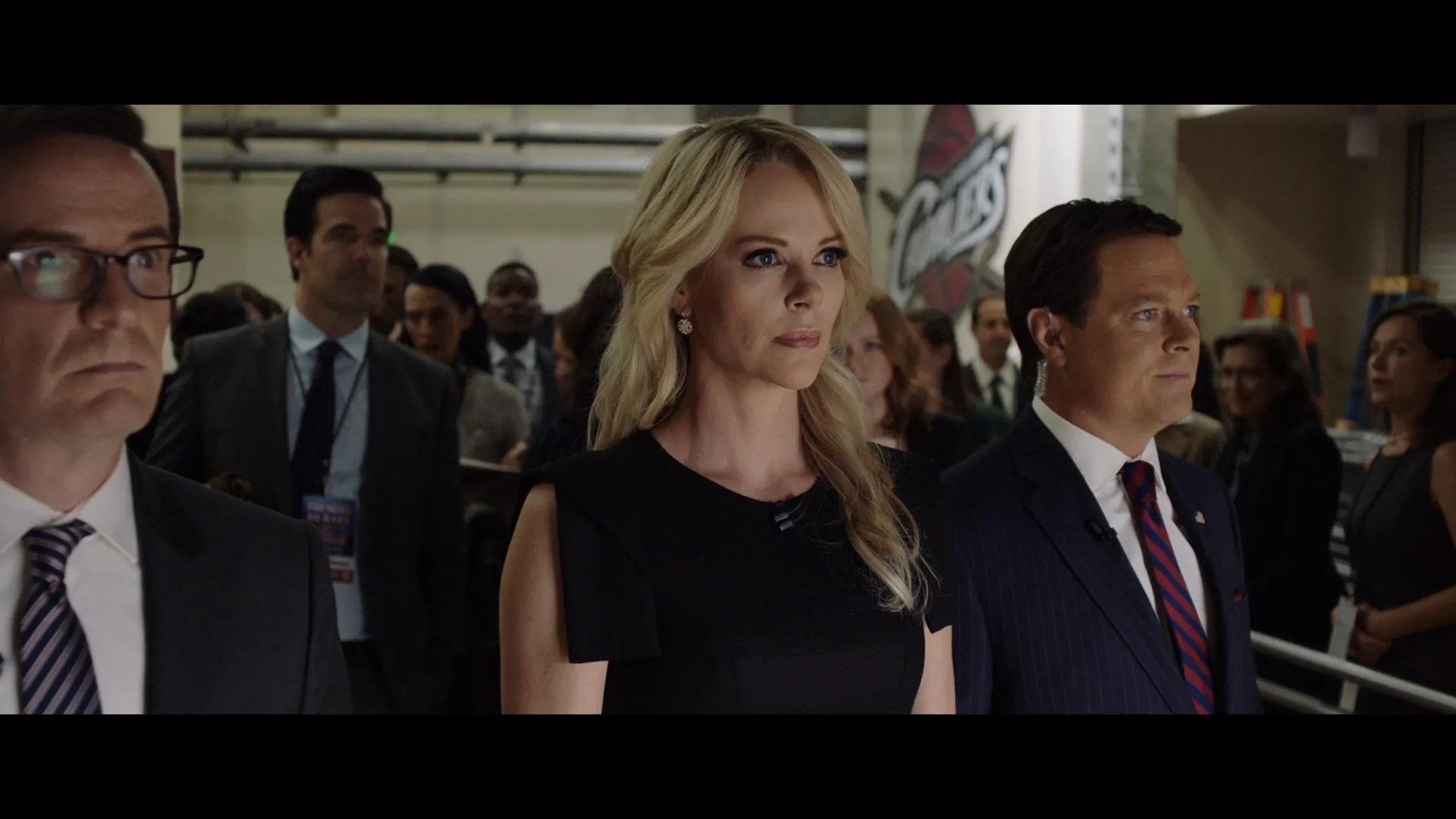 Charlize Theron and Rob Delaney in Bombshell (2019)