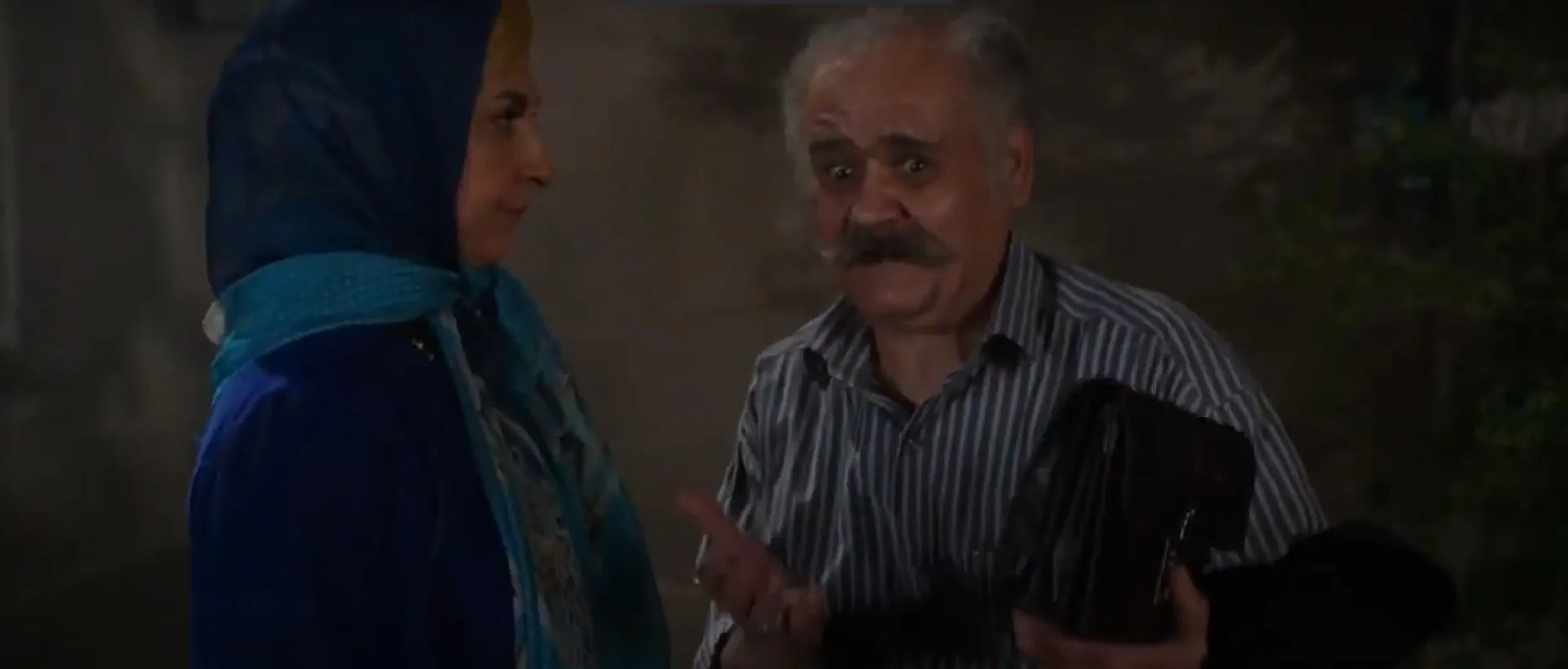 Akbar Abdi and Marjaneh Golchin in King of Ear (2013)