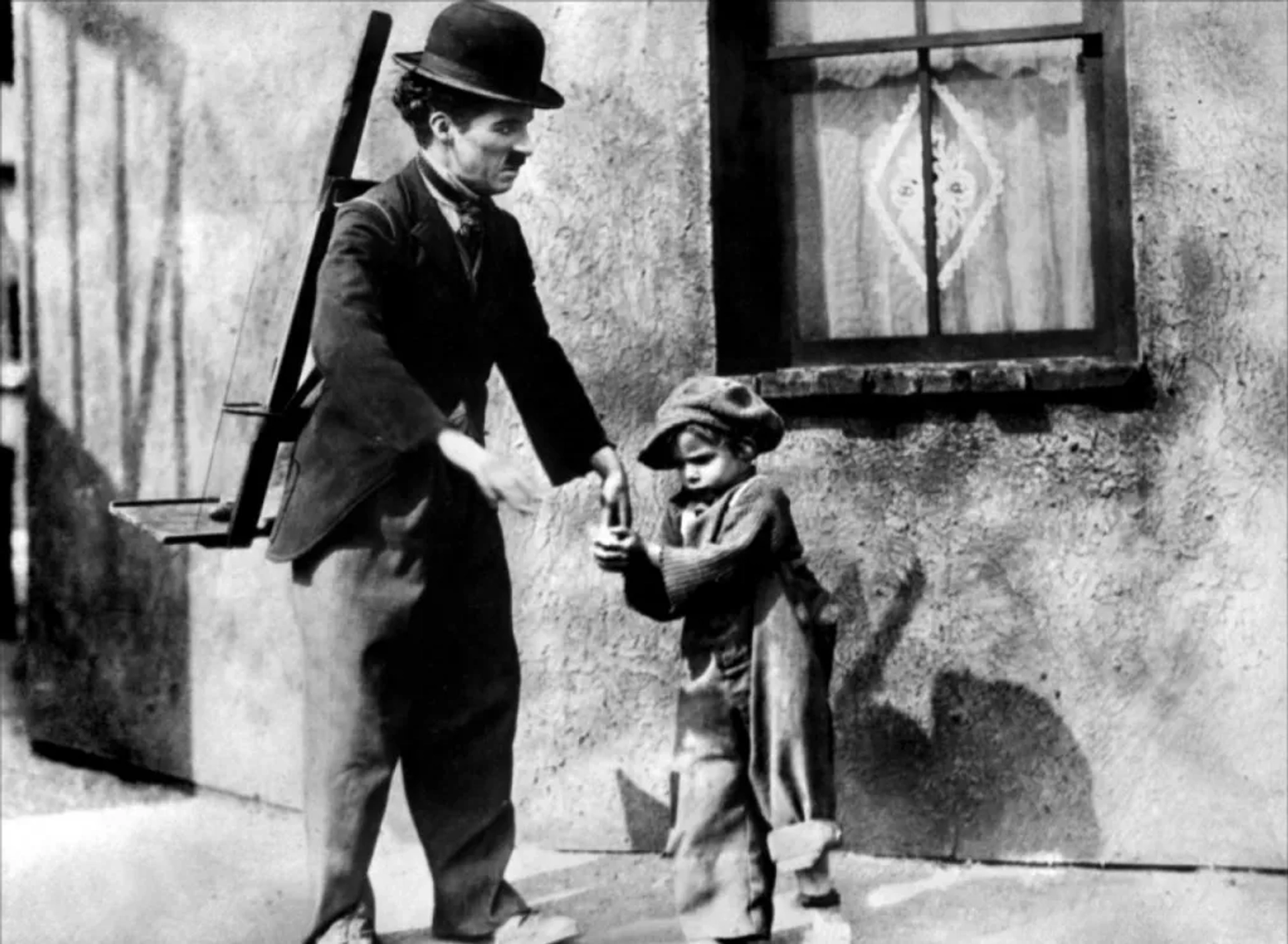 Charles Chaplin and Jackie Coogan in The Kid (1921)