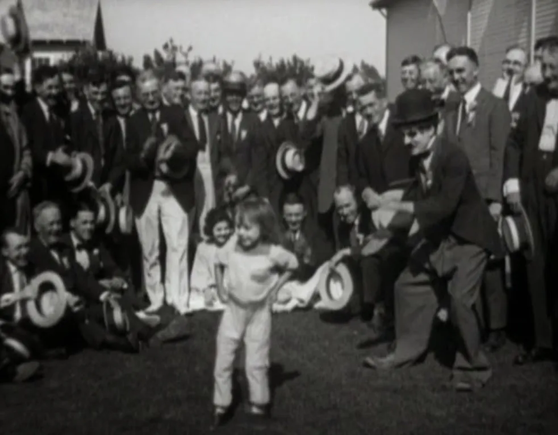 Charles Chaplin, Jackie Coogan, and Lita Grey at an event for The Kid (1921)