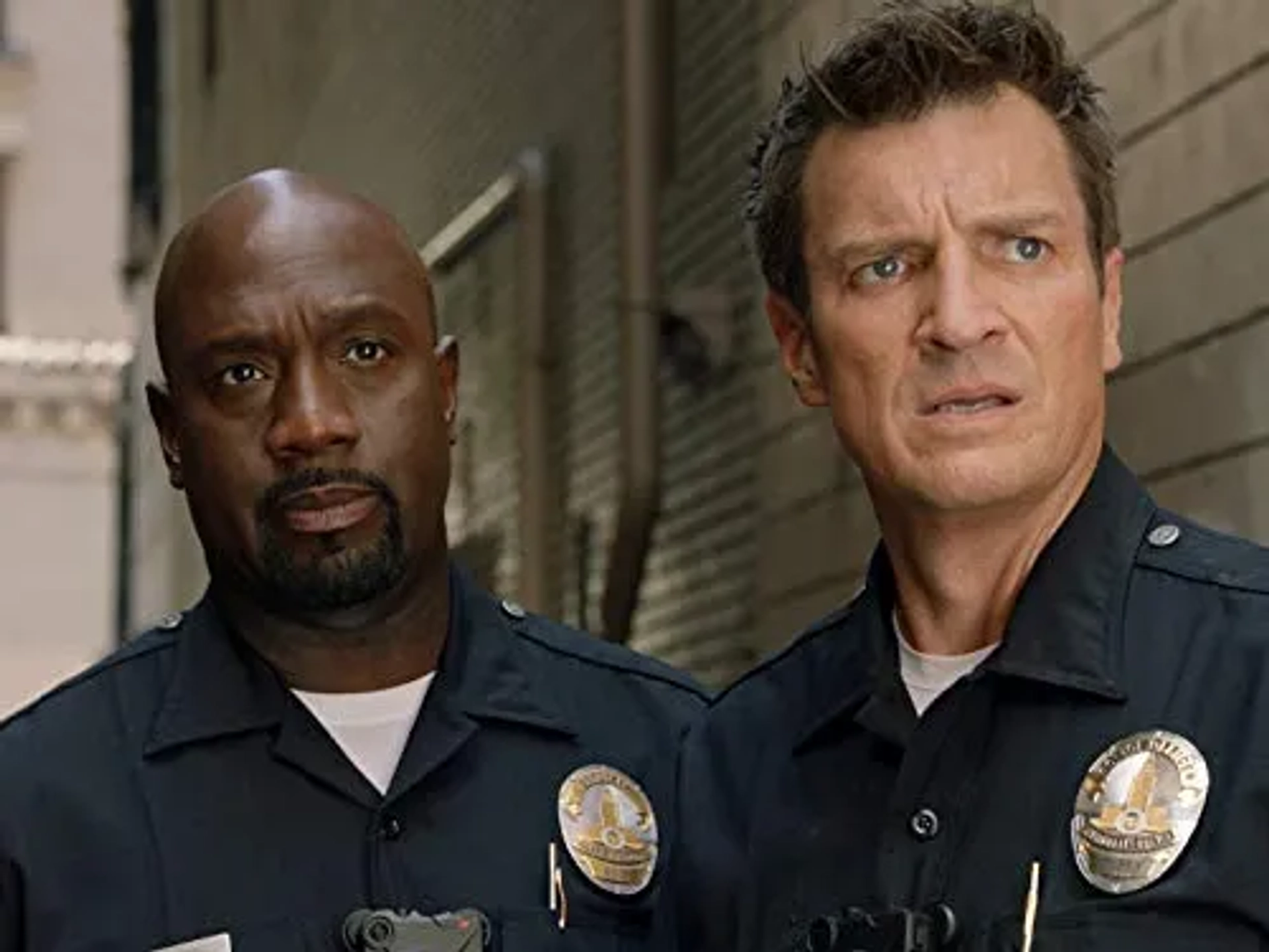 Nathan Fillion and Richard T. Jones in The Rookie: Impact (2019)