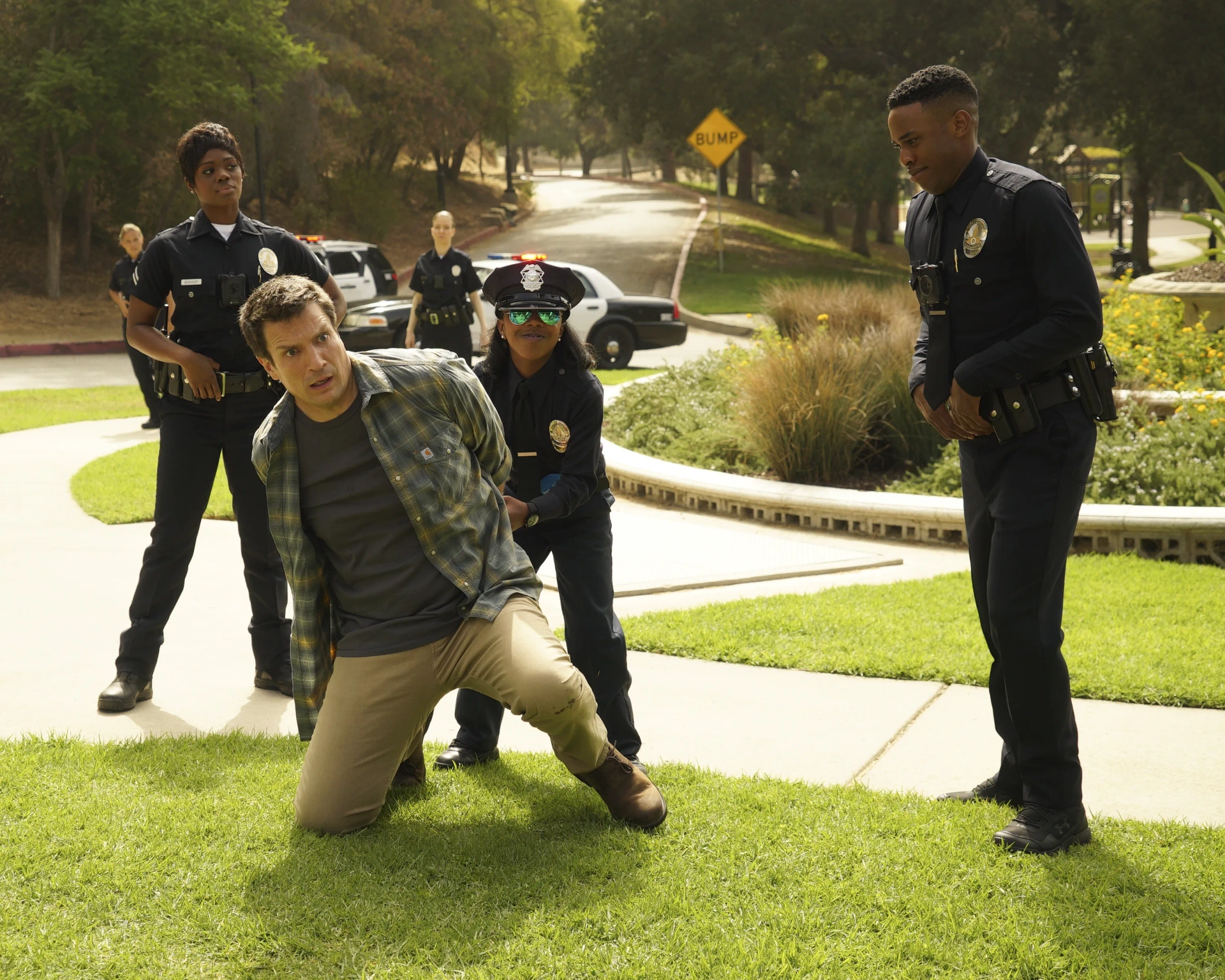 Nathan Fillion, Kaydence Patton, Titus Makin Jr., and Afton Williamson in The Rookie (2018)