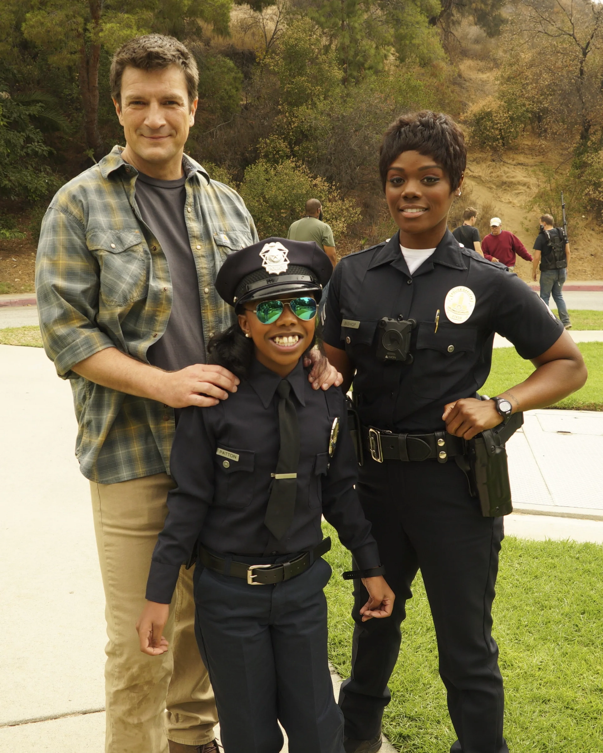 Nathan Fillion, Kaydence Patton, and Afton Williamson in The Rookie (2018)