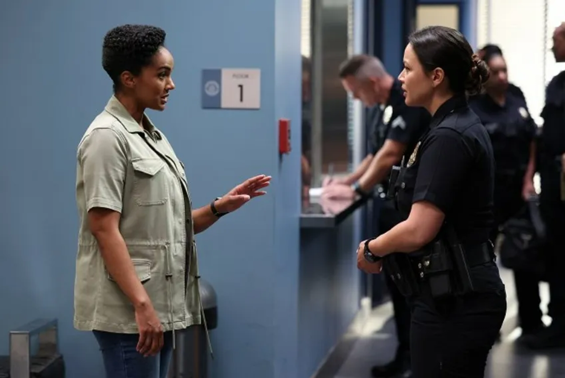 Melissa O'Neil and Mekia Cox in The Rookie: The Fugitive (2022)