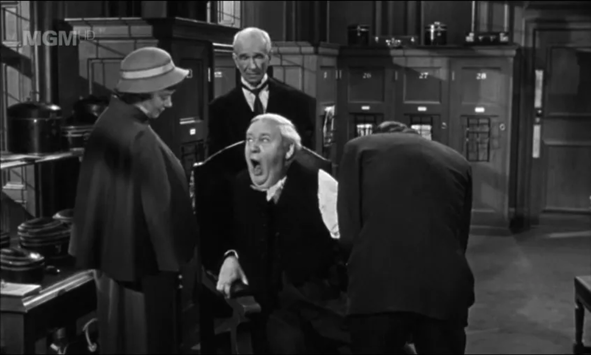 Charles Laughton, Elsa Lanchester, Jack Raine, and Ian Wolfe in Witness for the Prosecution (1957)