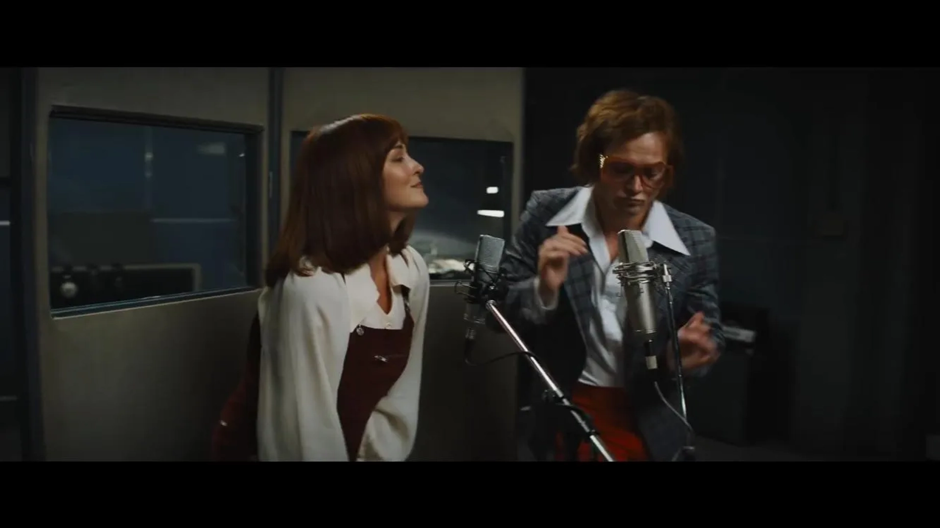 Rachel Muldoon and Taron Egerton in Rocketman (2019)