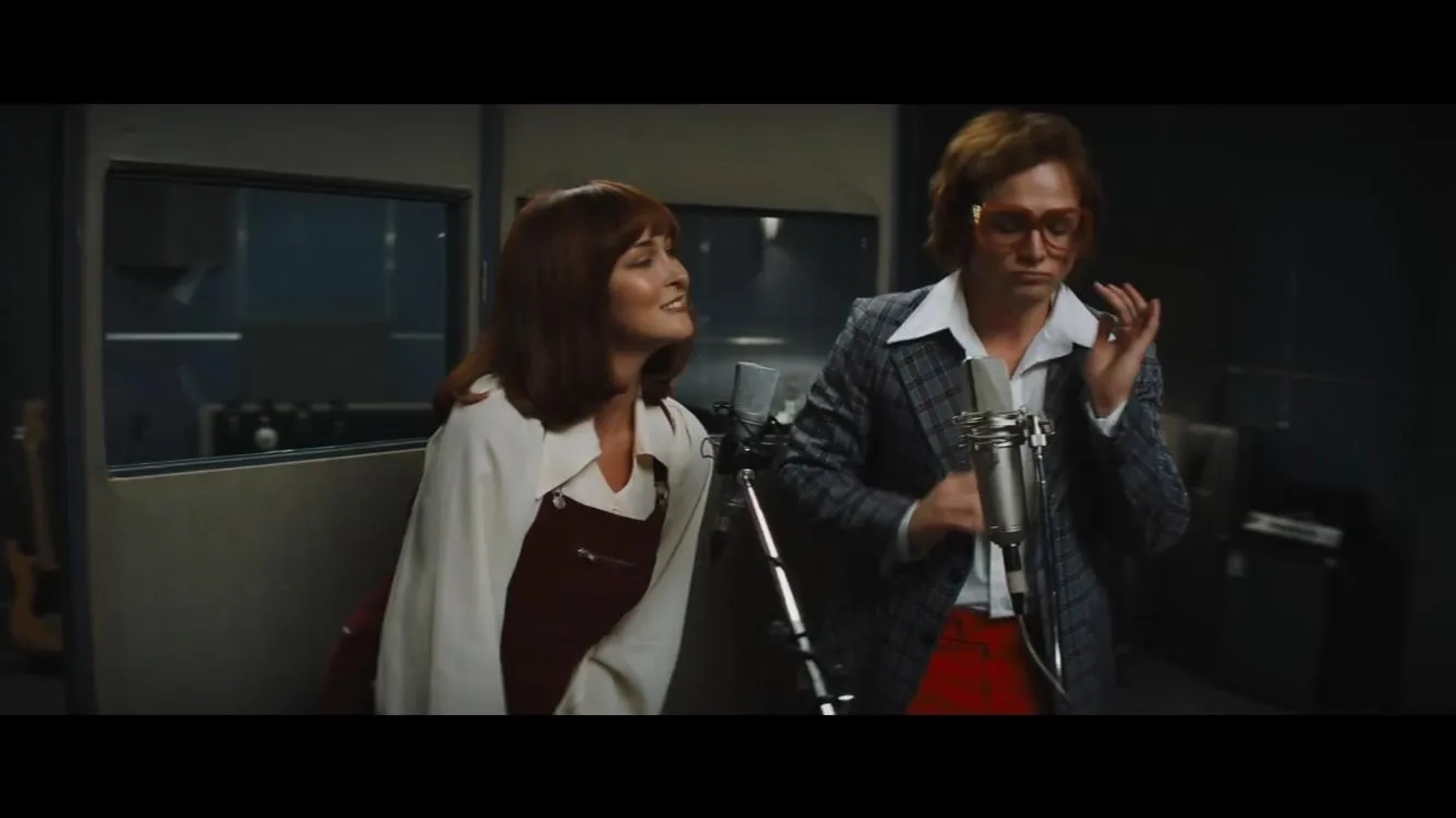 Rachel Muldoon and Taron Egerton in Rocketman (2019)