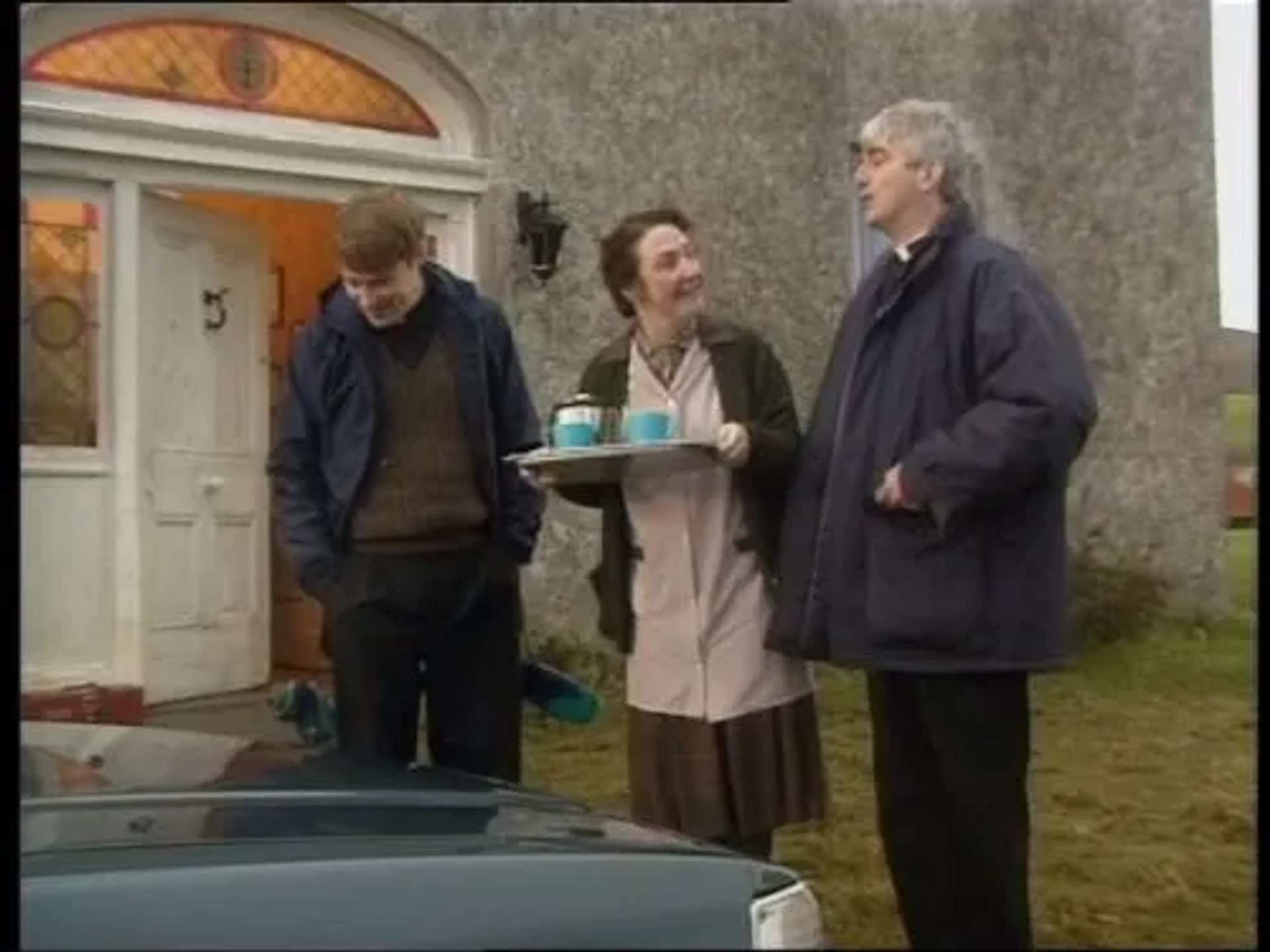 Pauline McLynn, Dermot Morgan, and Ardal O'Hanlon in Father Ted (1995)