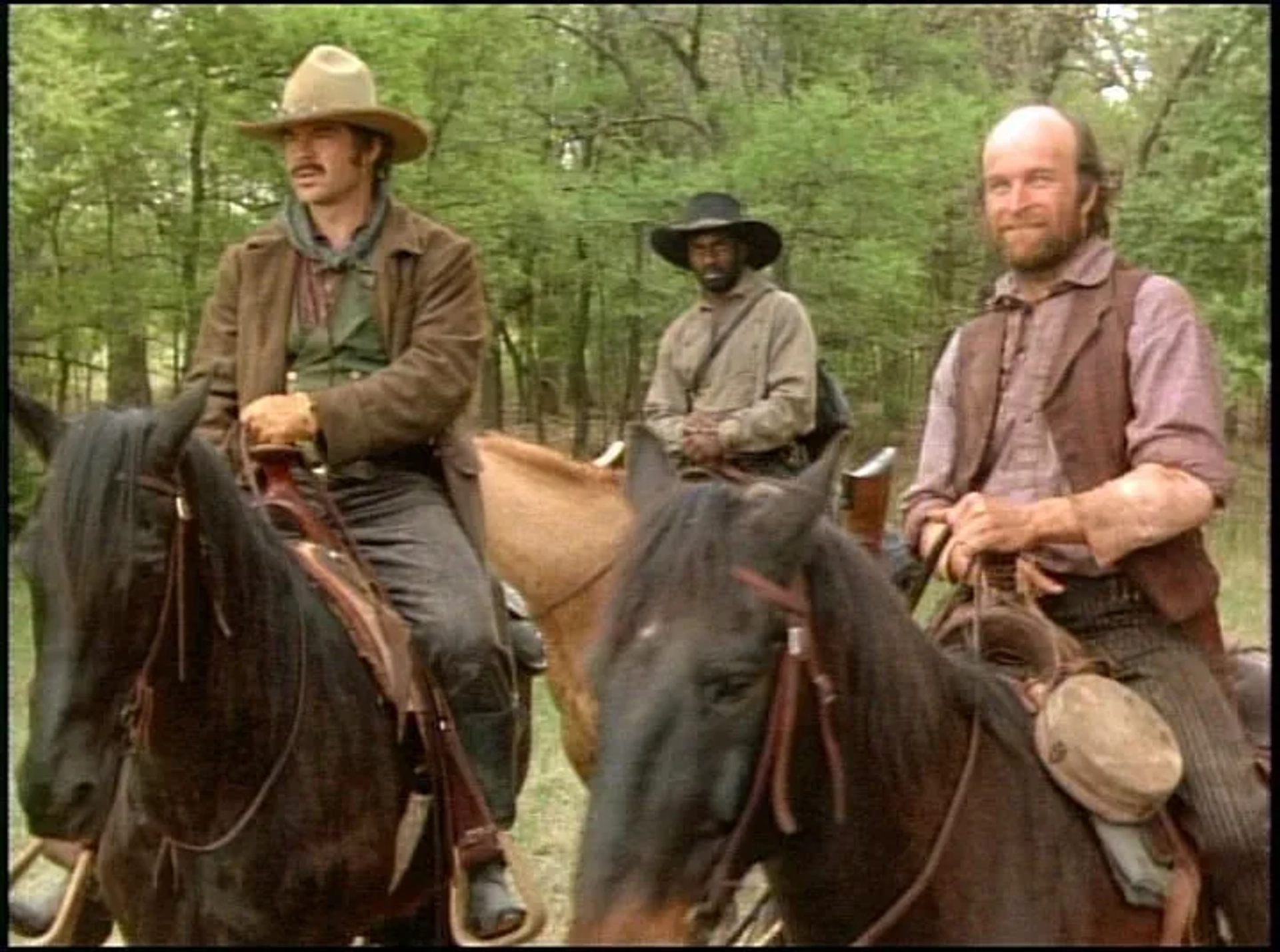 Robert Urich, Jerry Biggs, and Julius Tennon in Lonesome Dove (1989)