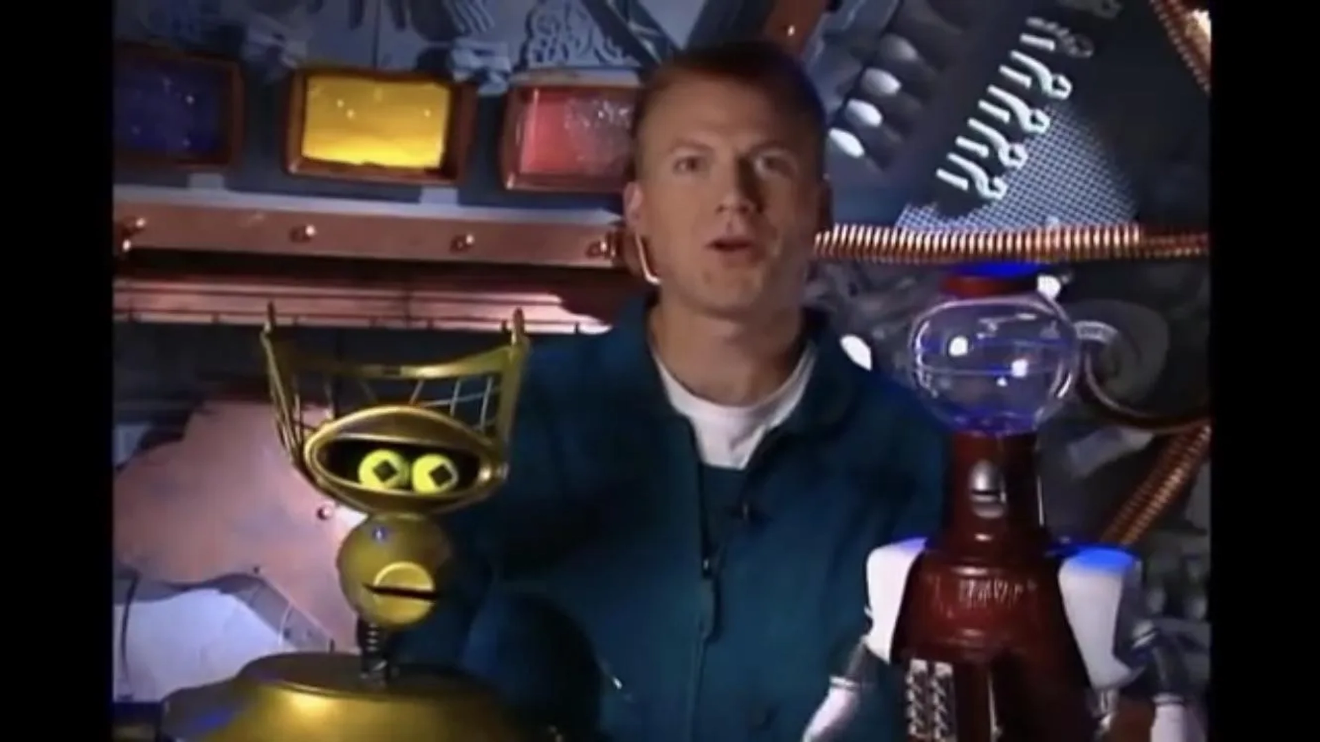 Bill Corbett, Kevin Murphy, and Michael J. Nelson in Mystery Science Theater 3000 (1988)