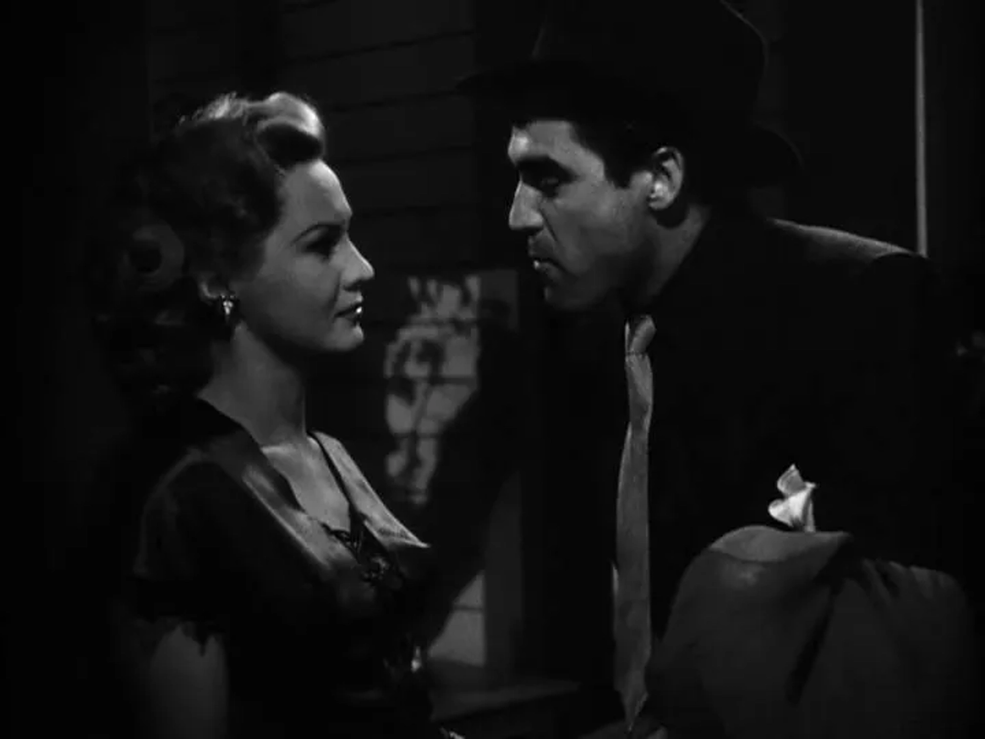 Steve Cochran and Virginia Mayo in White Heat (1949)