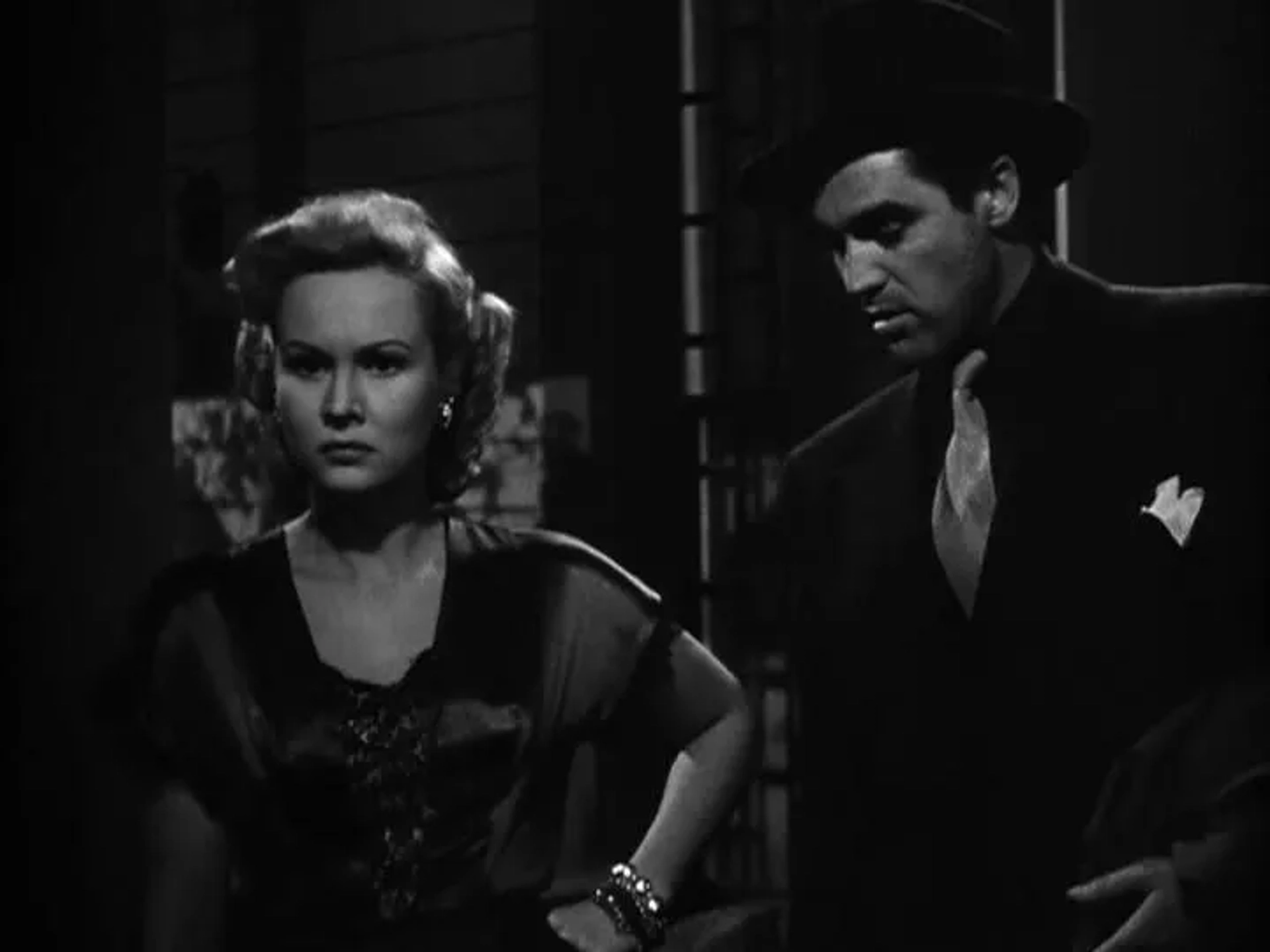 Steve Cochran and Virginia Mayo in White Heat (1949)