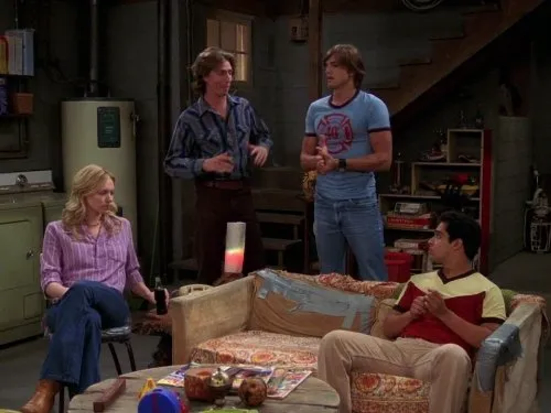 Ashton Kutcher, Wilmer Valderrama, Josh Meyers, and Laura Prepon in That '70s Show (1998)