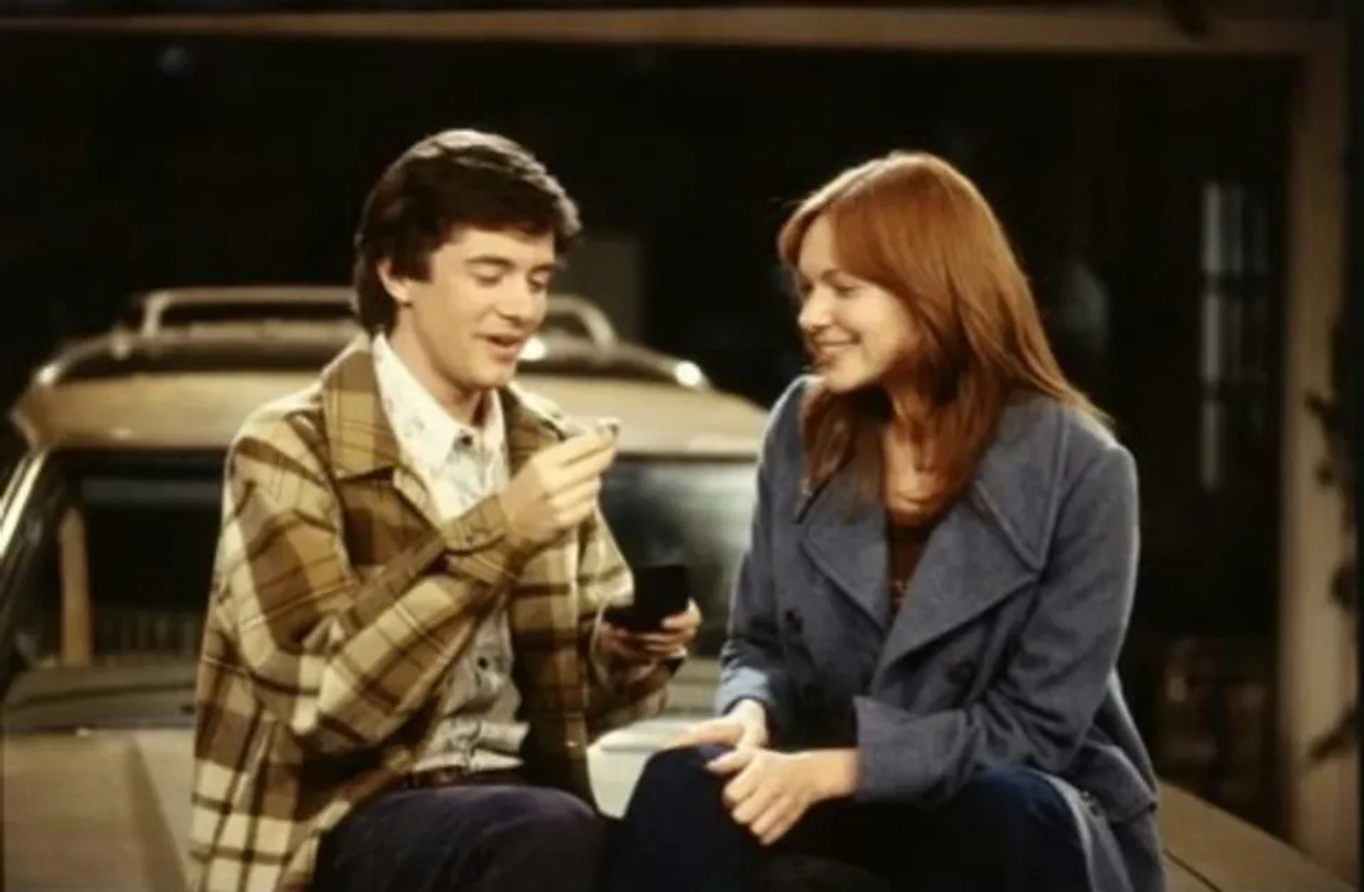 Topher Grace and Laura Prepon in That '70s Show (1998)