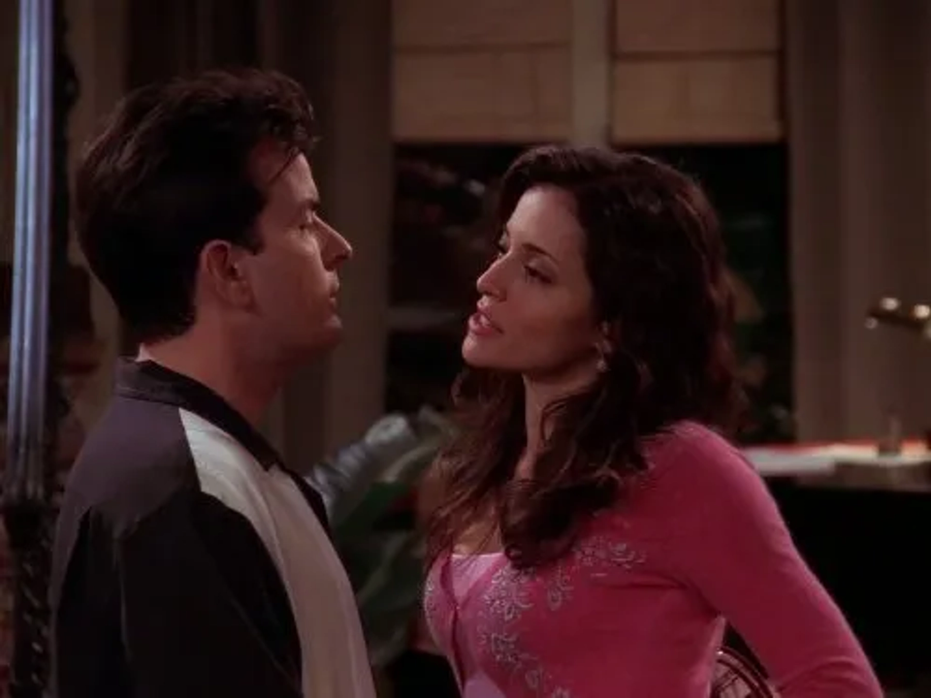 Charlie Sheen and Emmanuelle Vaugier in Two and a Half Men (2003)