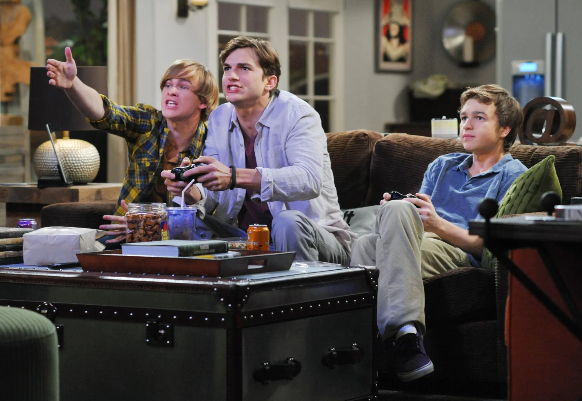 Ashton Kutcher, Angus T. Jones, and Graham Patrick Martin in Two and a Half Men (2003)