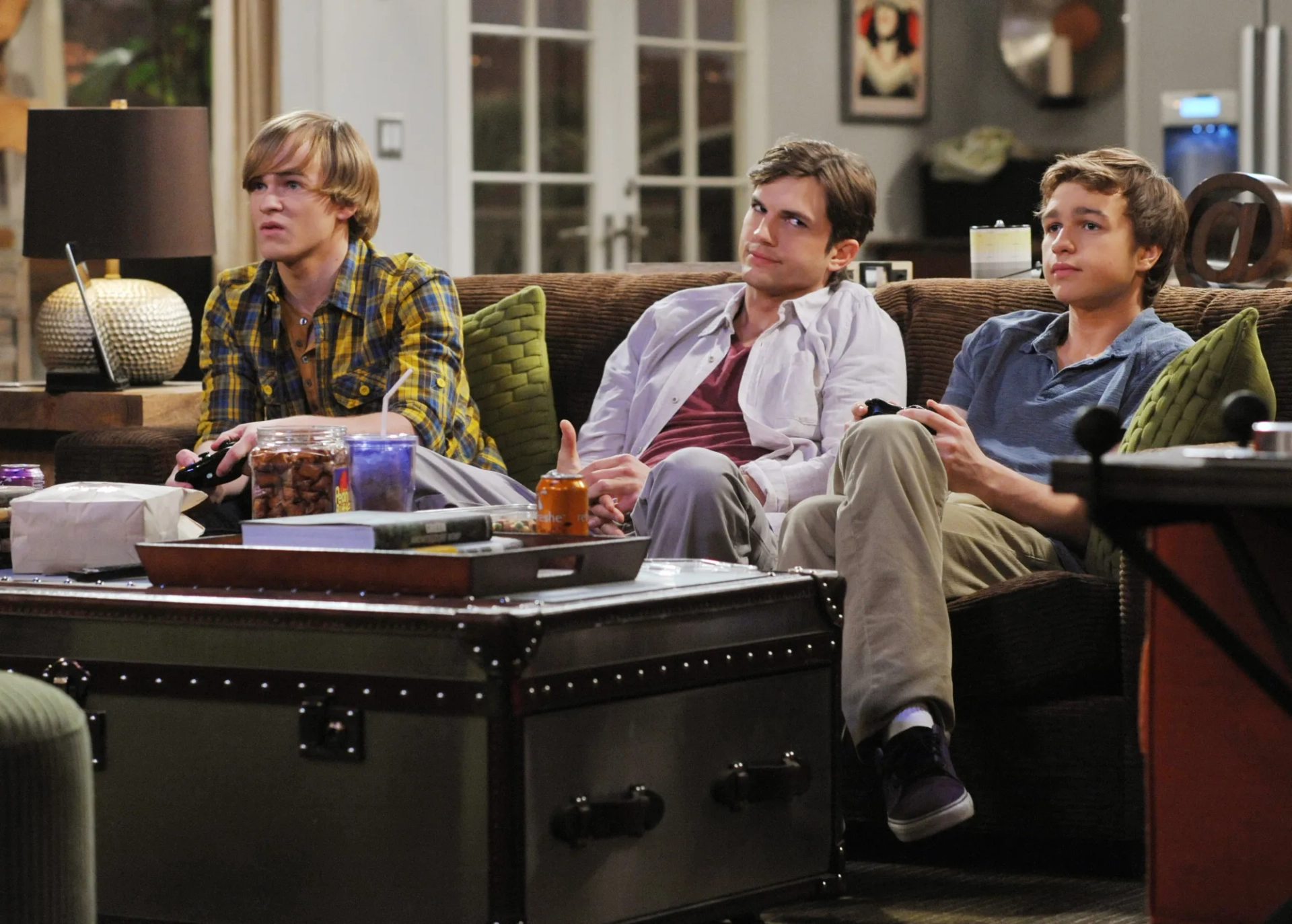 Ashton Kutcher, Angus T. Jones, and Graham Patrick Martin in Two and a Half Men (2003)