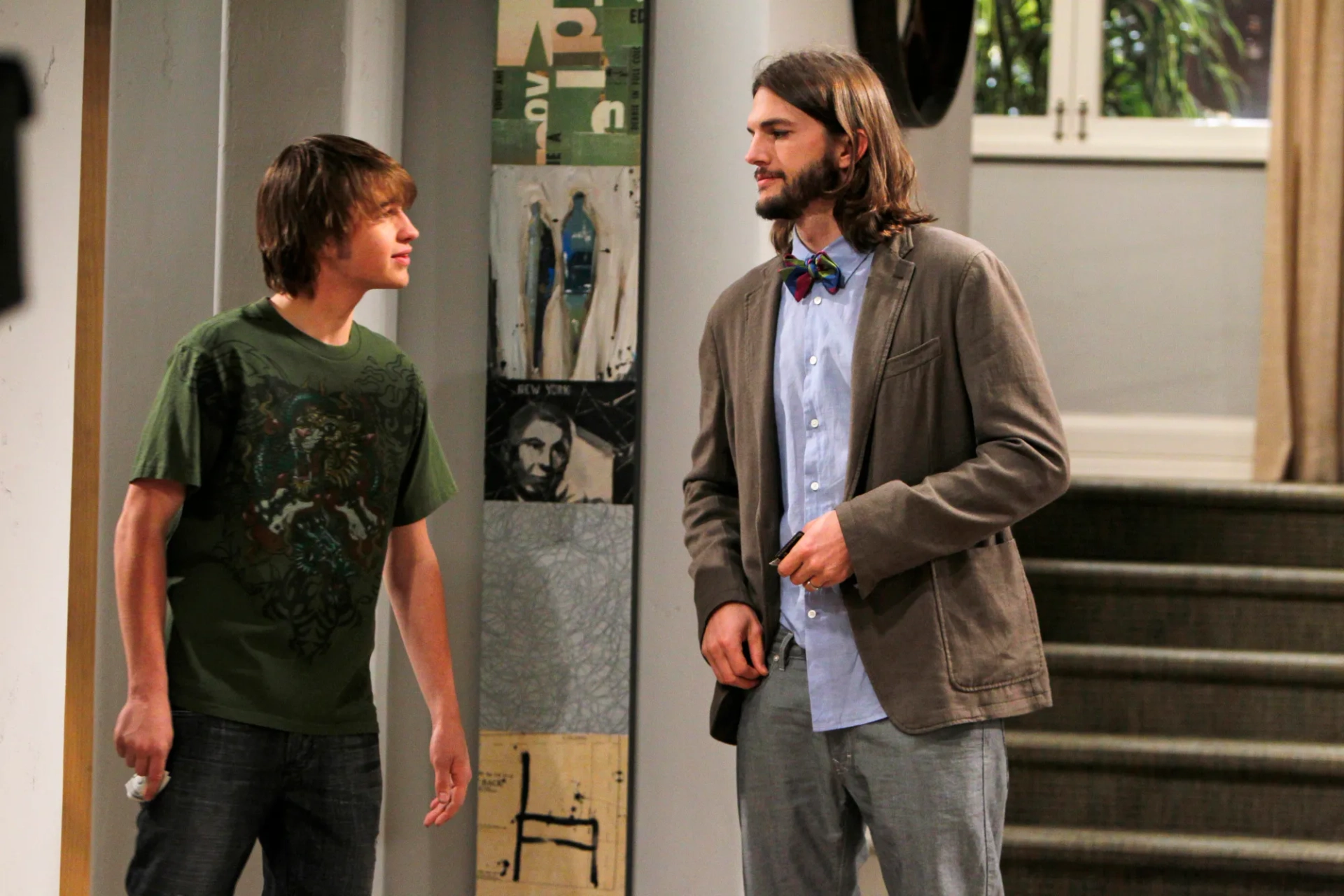 Ashton Kutcher and Angus T. Jones in Two and a Half Men (2003)