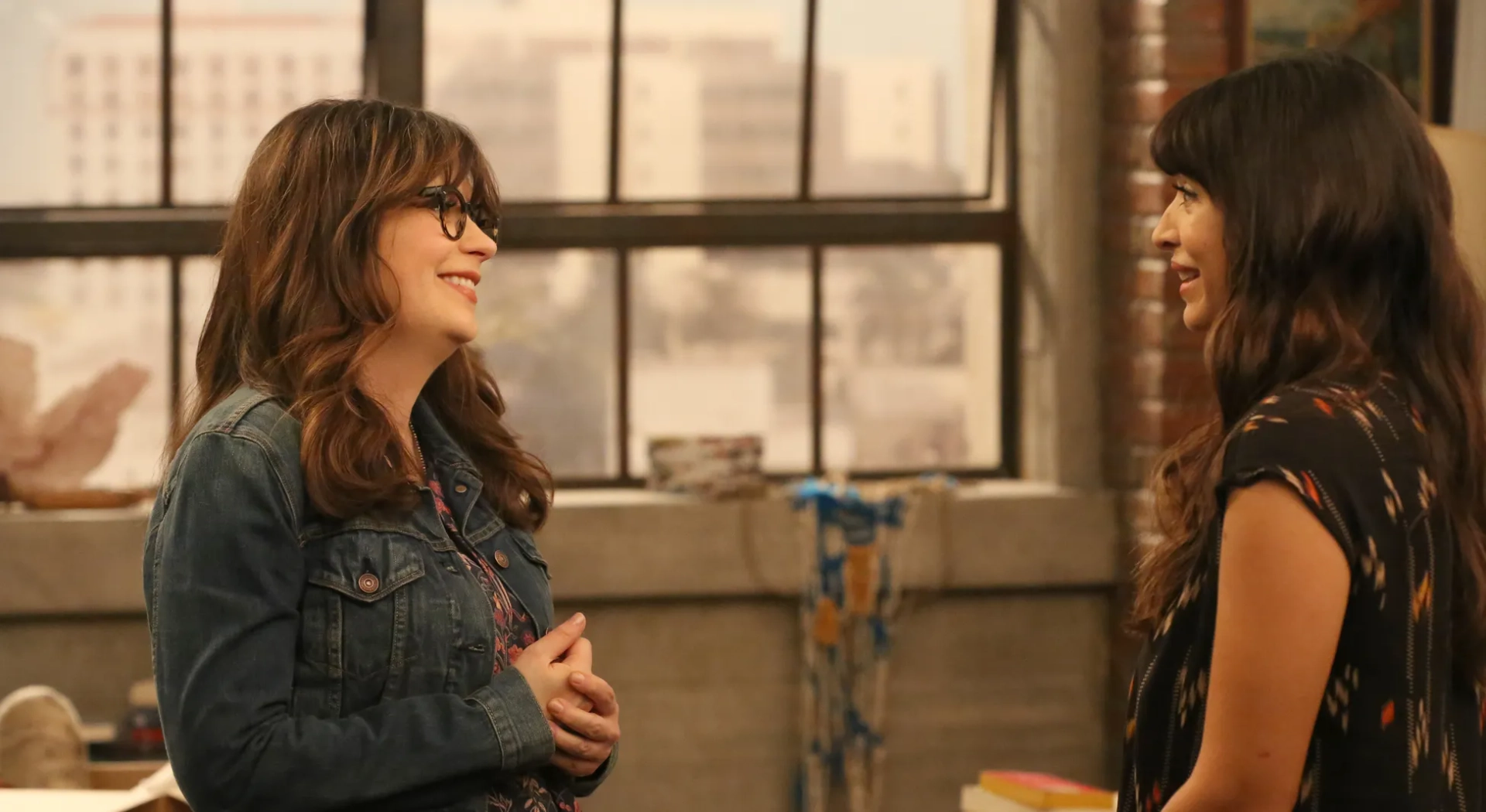 Zooey Deschanel and Hannah Simone in New Girl (2011)