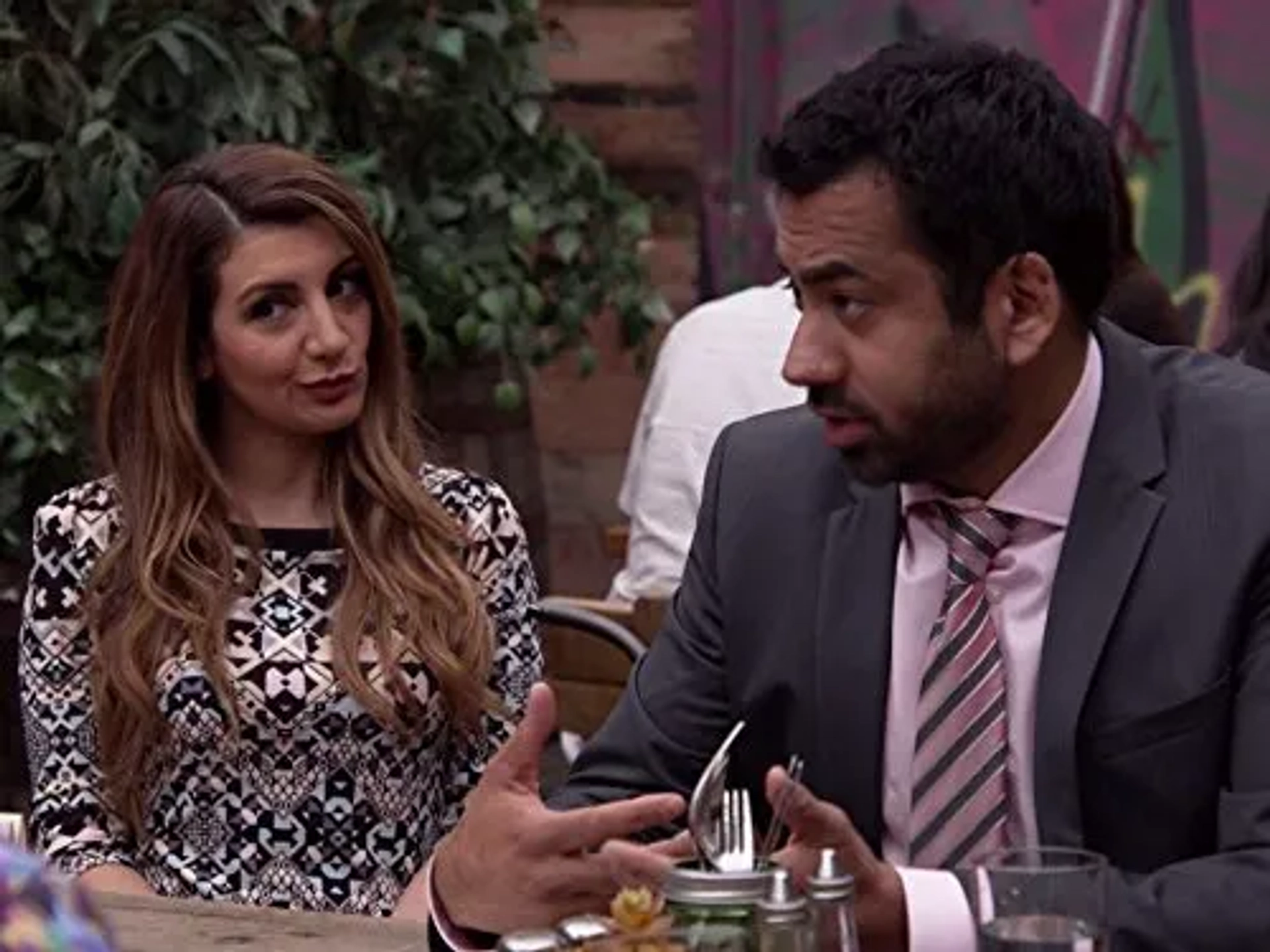 Kal Penn and Nasim Pedrad in New Girl (2011)