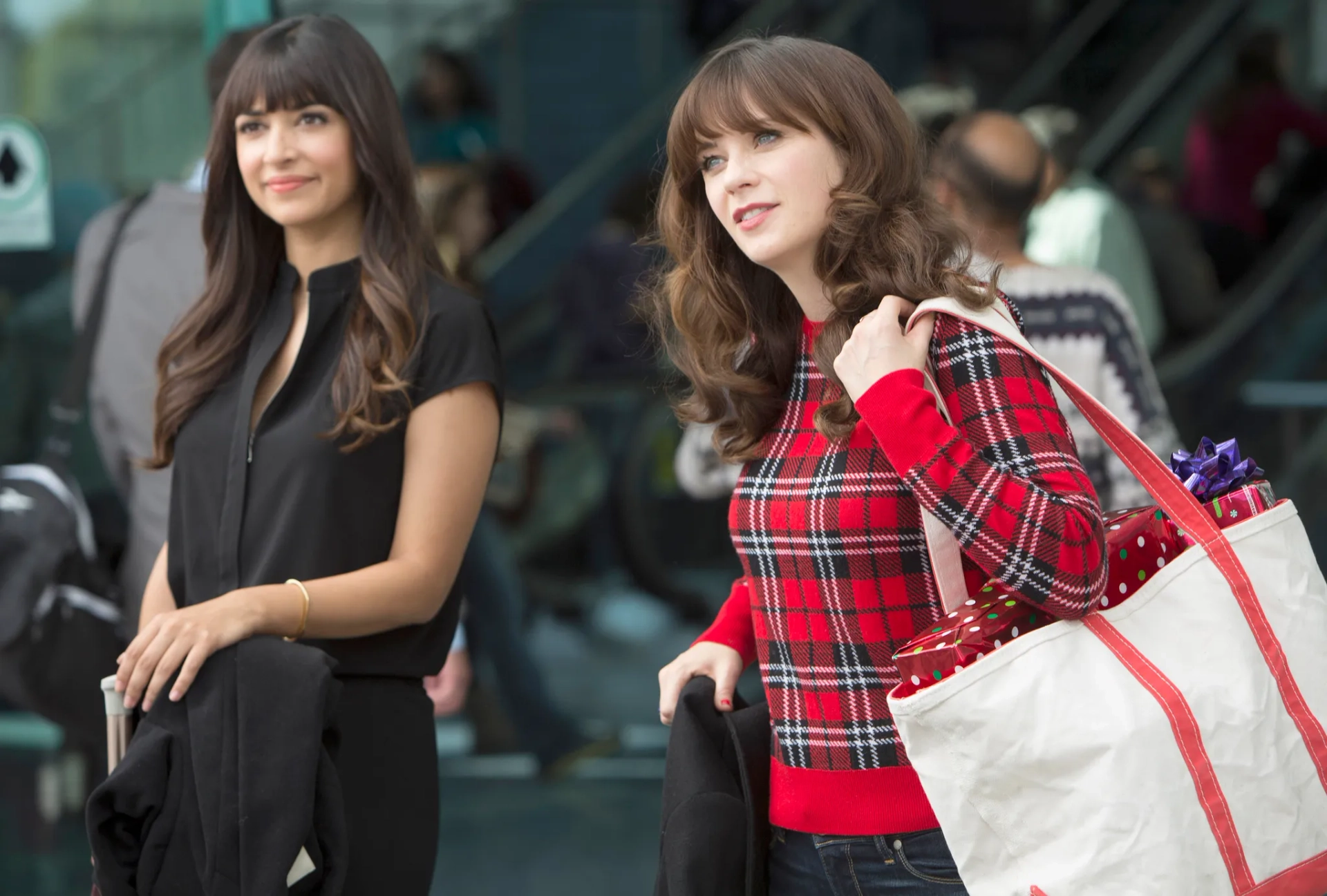 Zooey Deschanel and Hannah Simone in New Girl (2011)