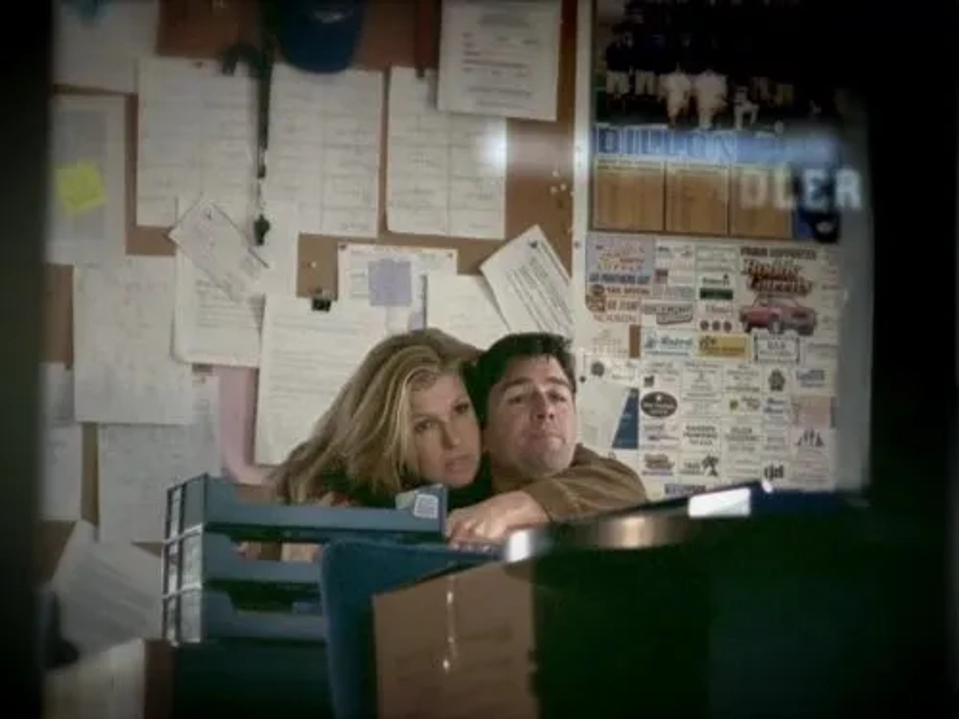 Connie Britton and Kyle Chandler in Friday Night Lights (2006)