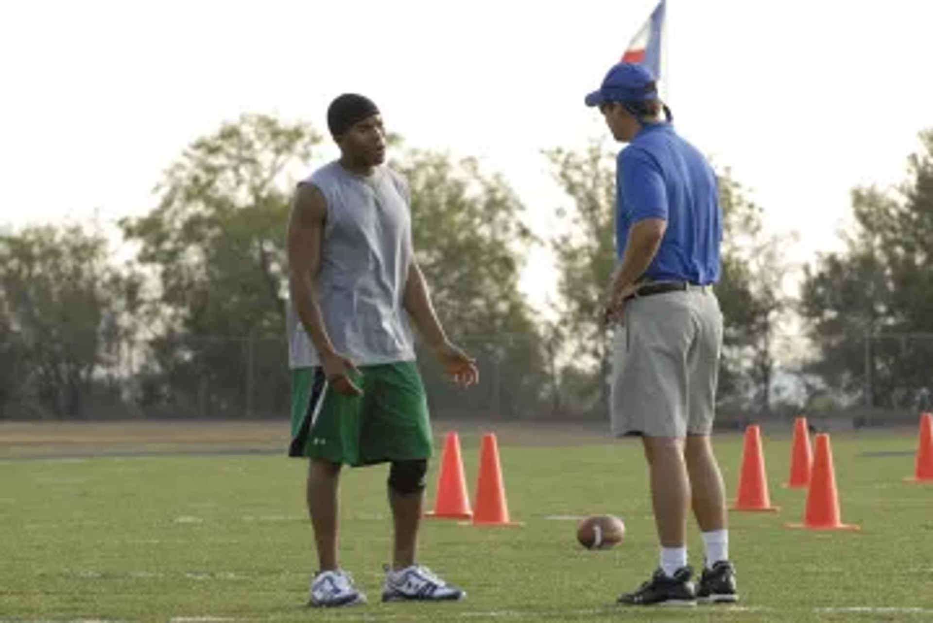 Kyle Chandler and Gaius Charles in Friday Night Lights (2006)