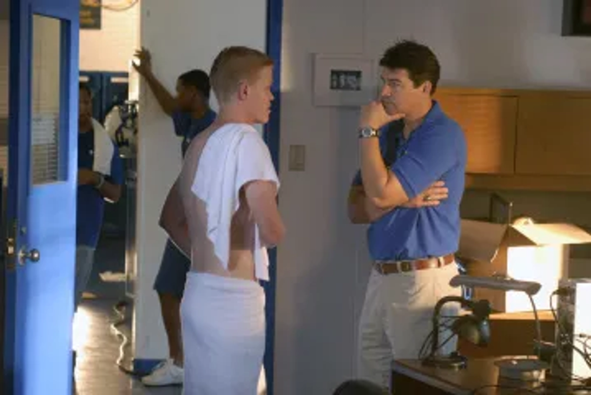 Kyle Chandler and Jesse Plemons in Friday Night Lights (2006)