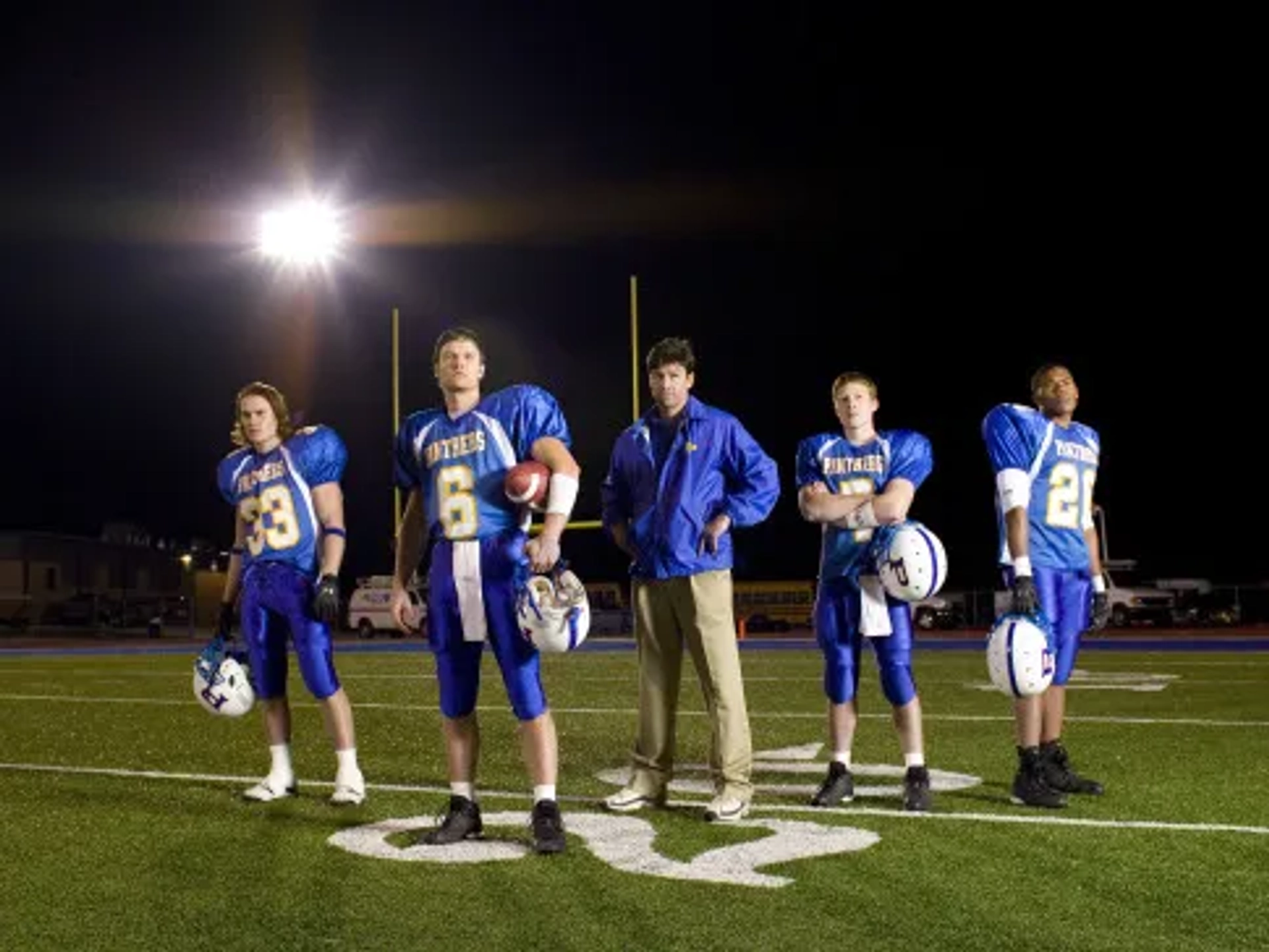 Kyle Chandler, Zach Gilford, Taylor Kitsch, Gaius Charles, and Scott Porter in Friday Night Lights (2006)