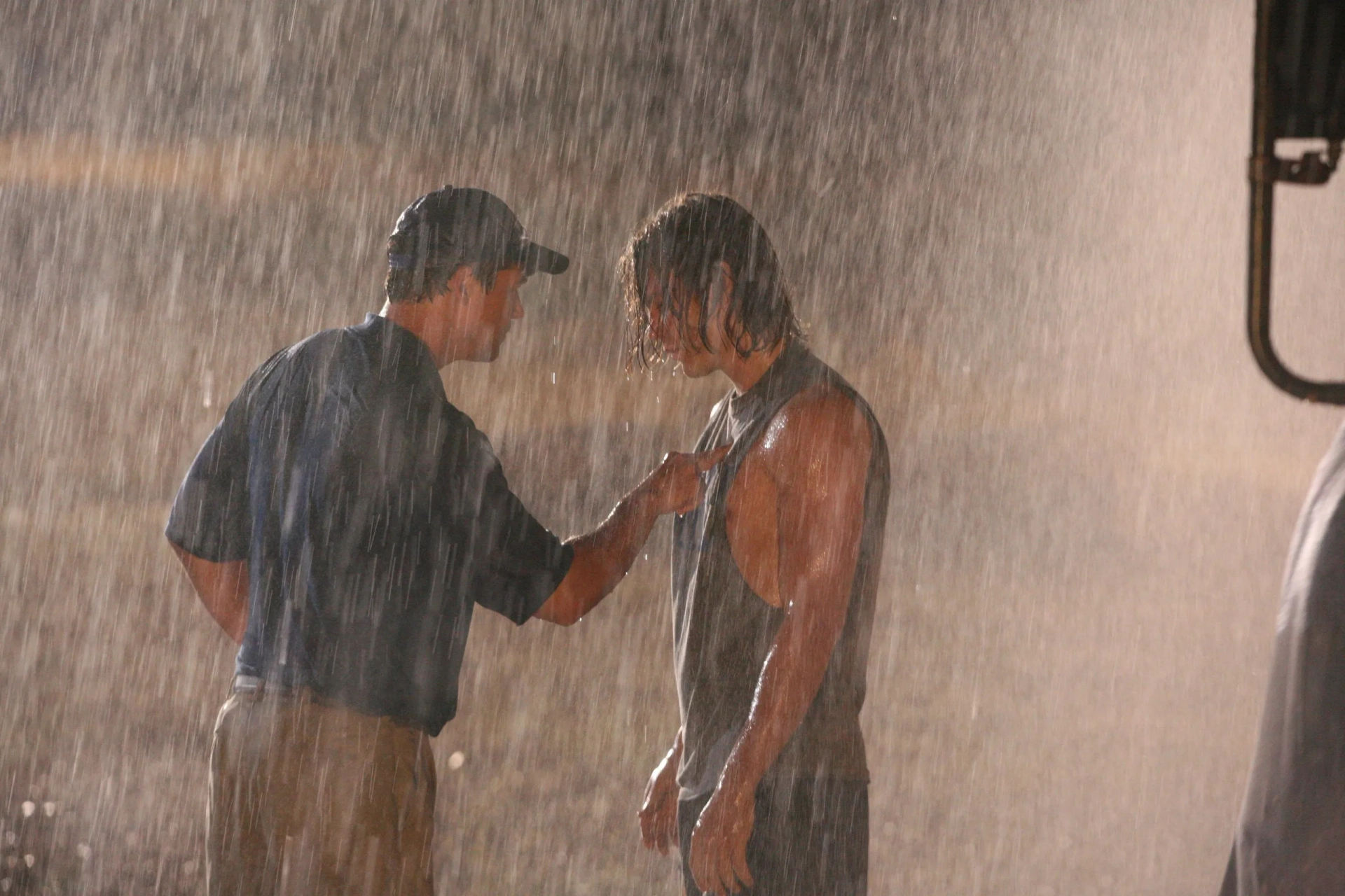 Kyle Chandler and Taylor Kitsch in Friday Night Lights (2006)