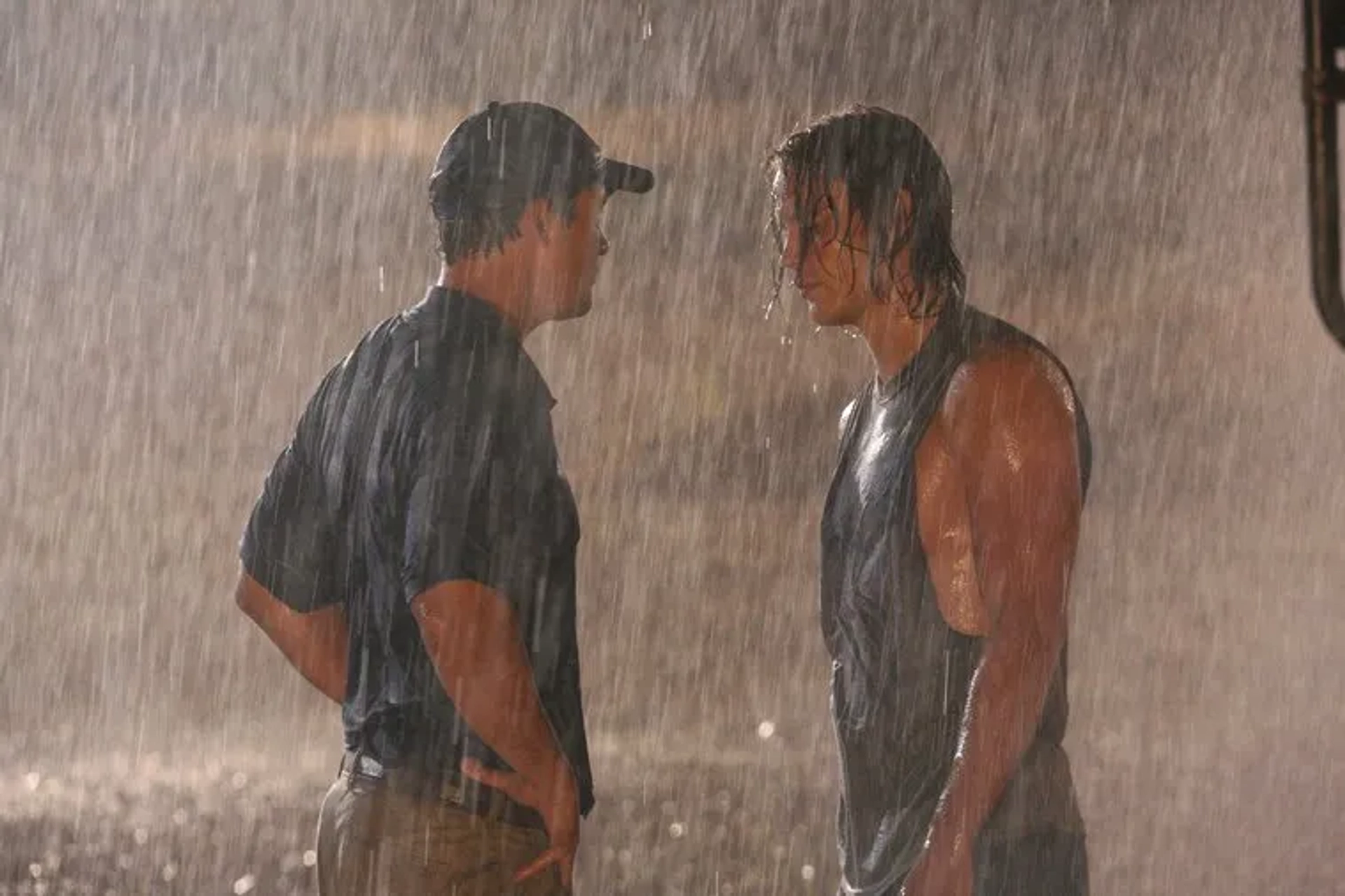 Kyle Chandler and Taylor Kitsch in Friday Night Lights (2006)